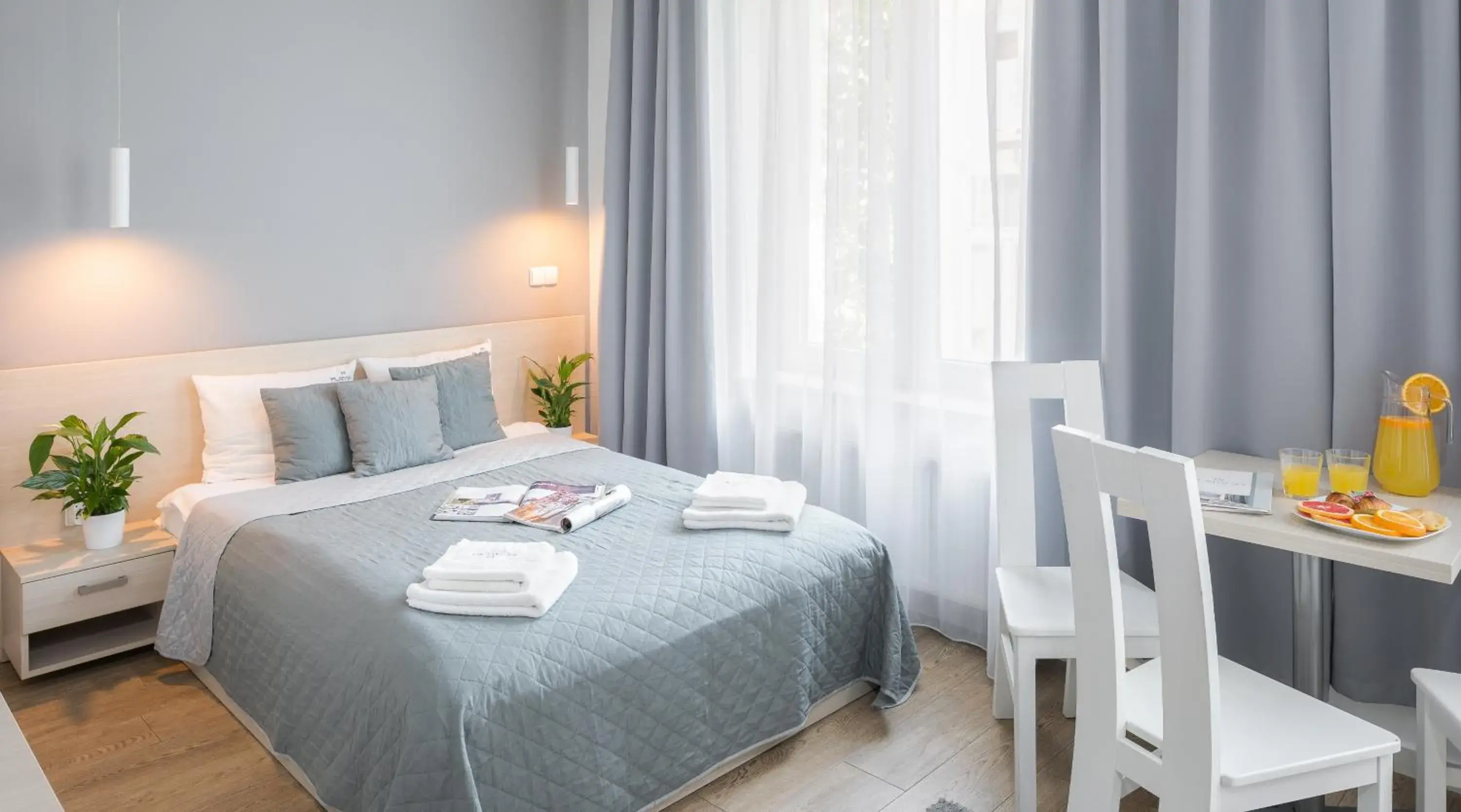 Photo of the whole room, Bed in Apartamenty Platinia - komfortowe noclegi Kraków Stare Miasto Photo of the whole room, Bed in Apartamenty Platinia - komfortowe noclegi Kraków Stare Miasto