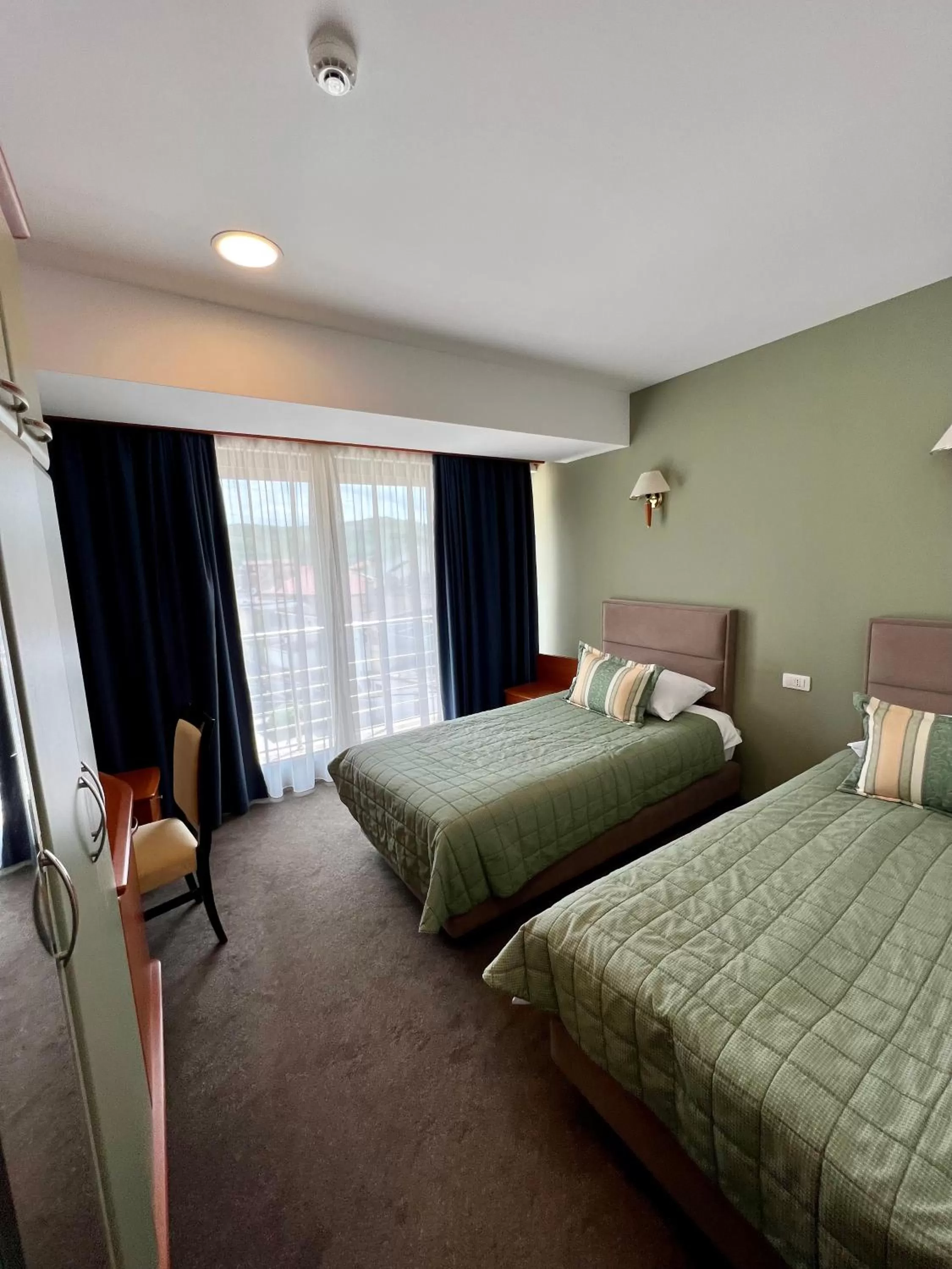 Bed in Hotel Millennium