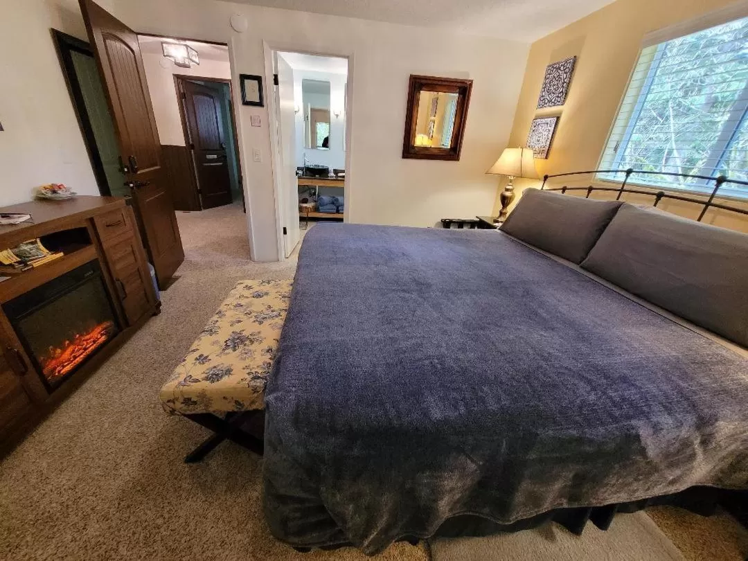 Bed in Misty Valley Inn