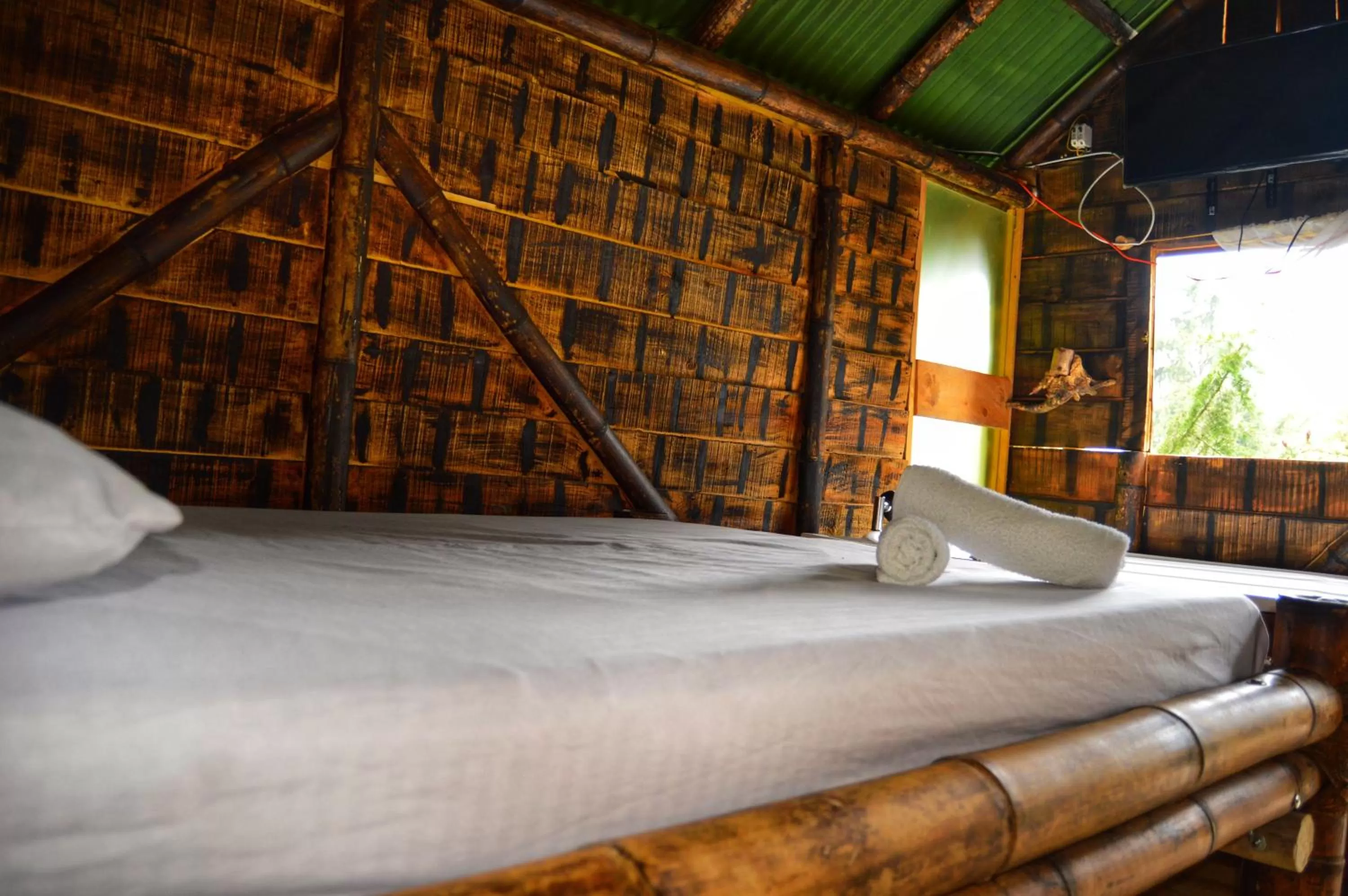 Bedroom, Bed in Cabañas Rústicas El Viejo Tambo By Rotamundos