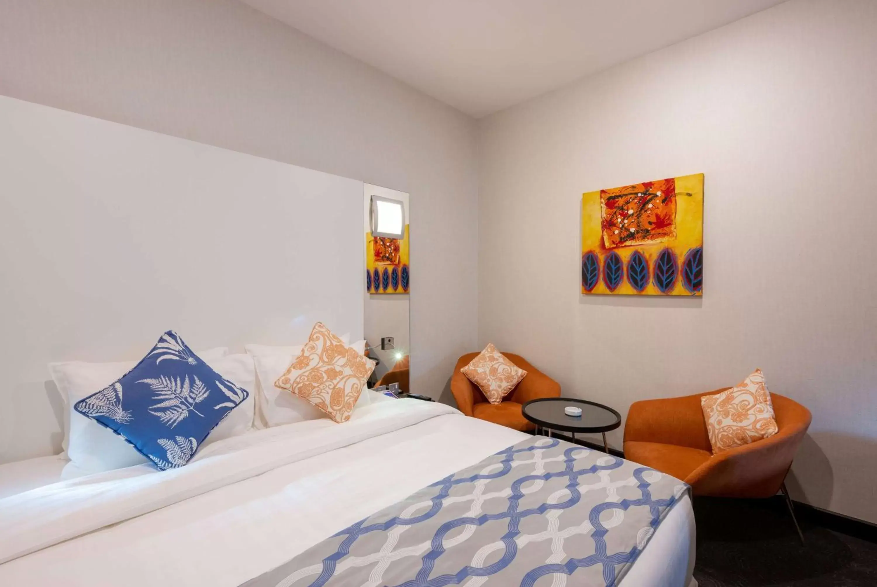 Photo of the whole room, Bed in Ramada Encore Doha by Wyndham Photo of the whole room, Bed in Ramada Encore Doha by Wyndham