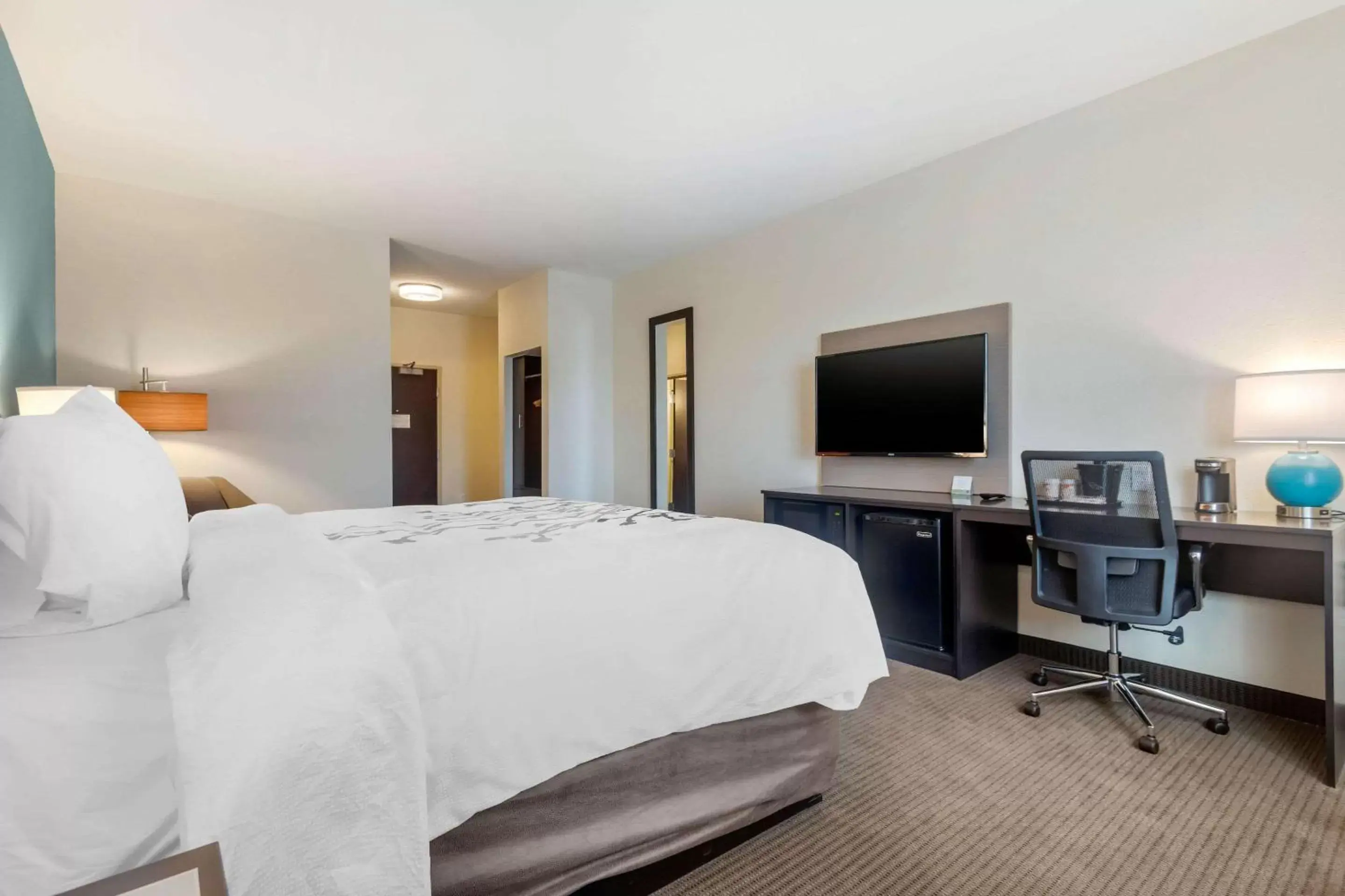 Photo of the whole room, TV/Entertainment Center in Sleep Inn & Suites Bricktown - near Medical Center