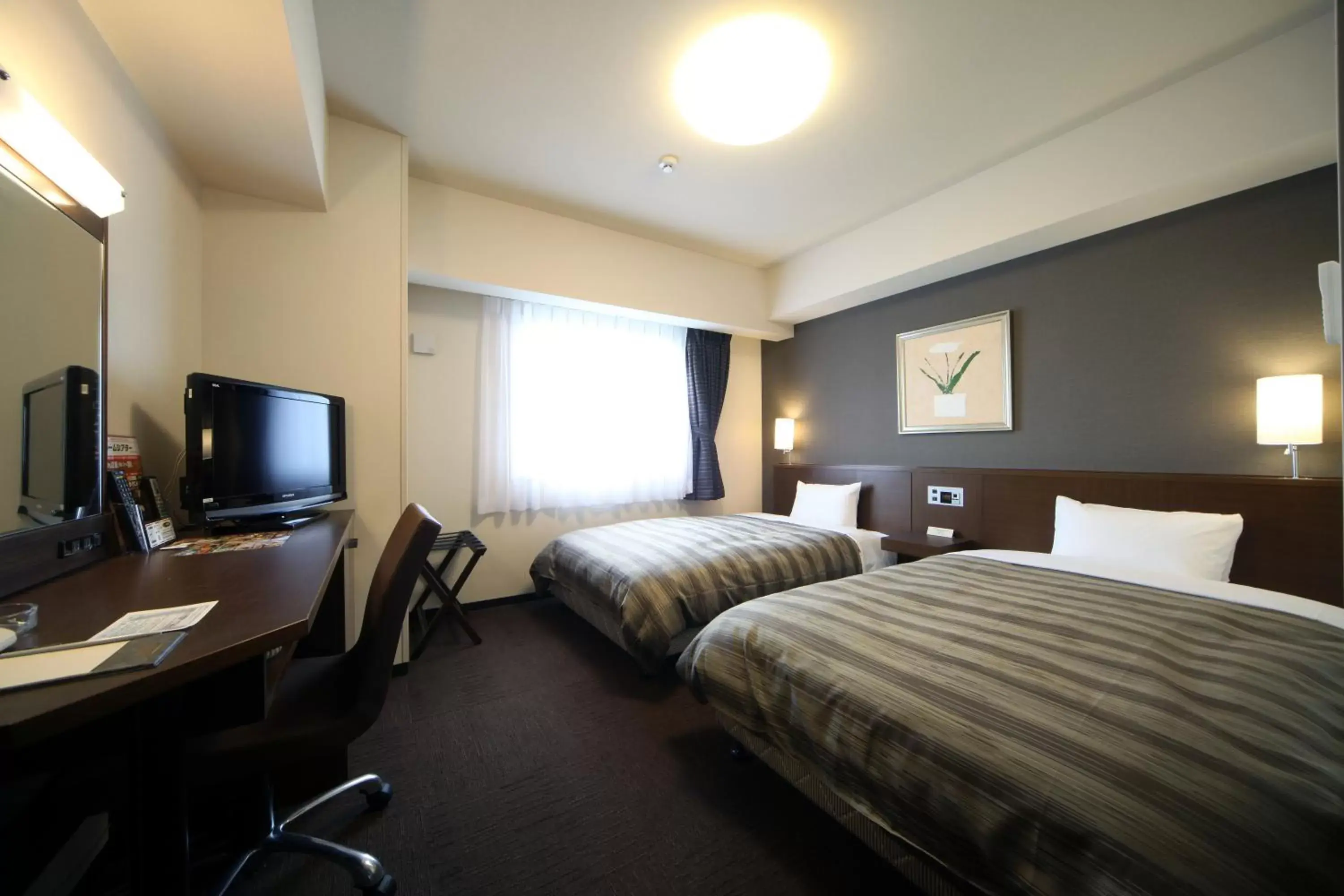 Photo of the whole room, TV/Entertainment Center in Hotel Route-Inn Marugame