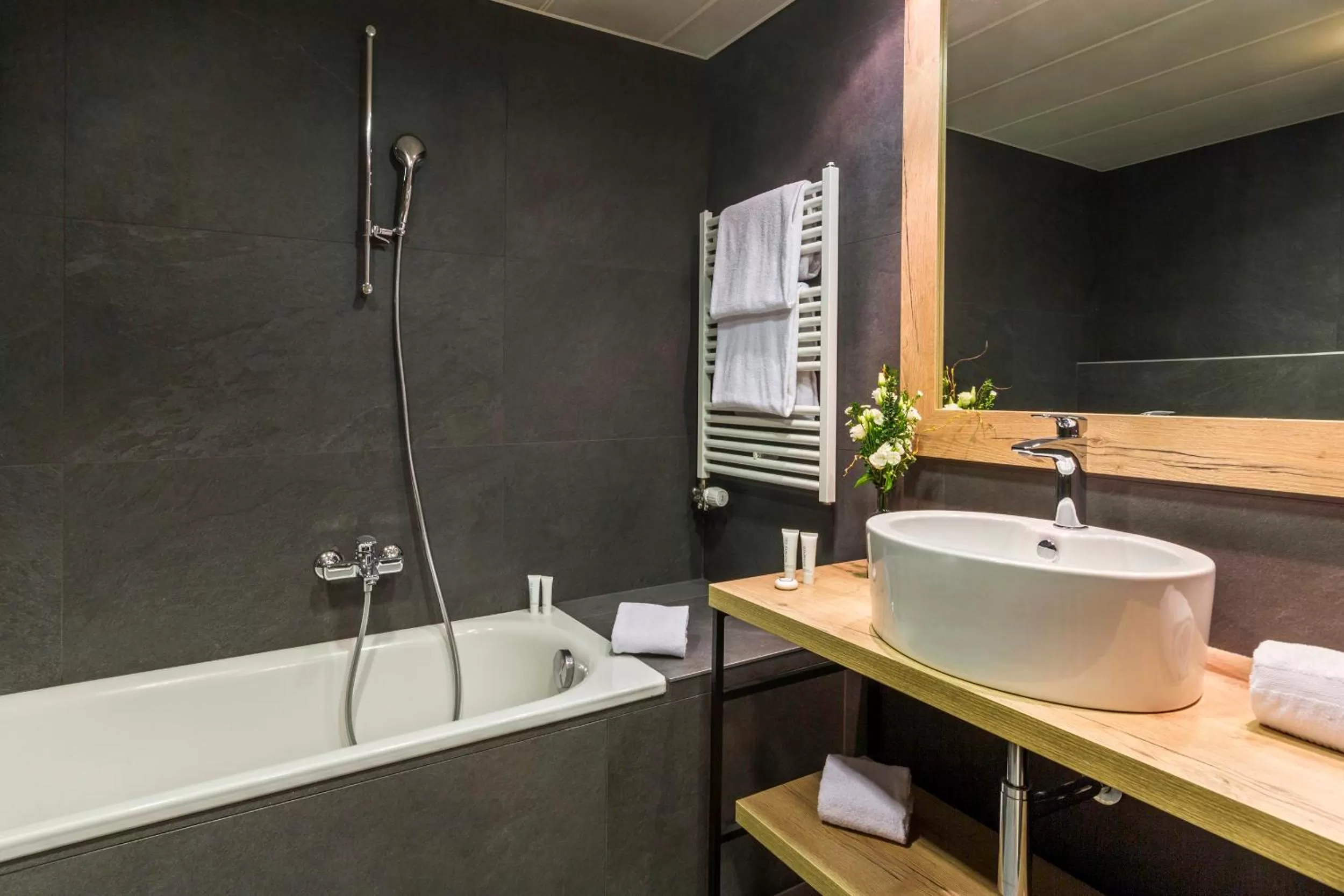 Bathroom in Edelweiss Manotel