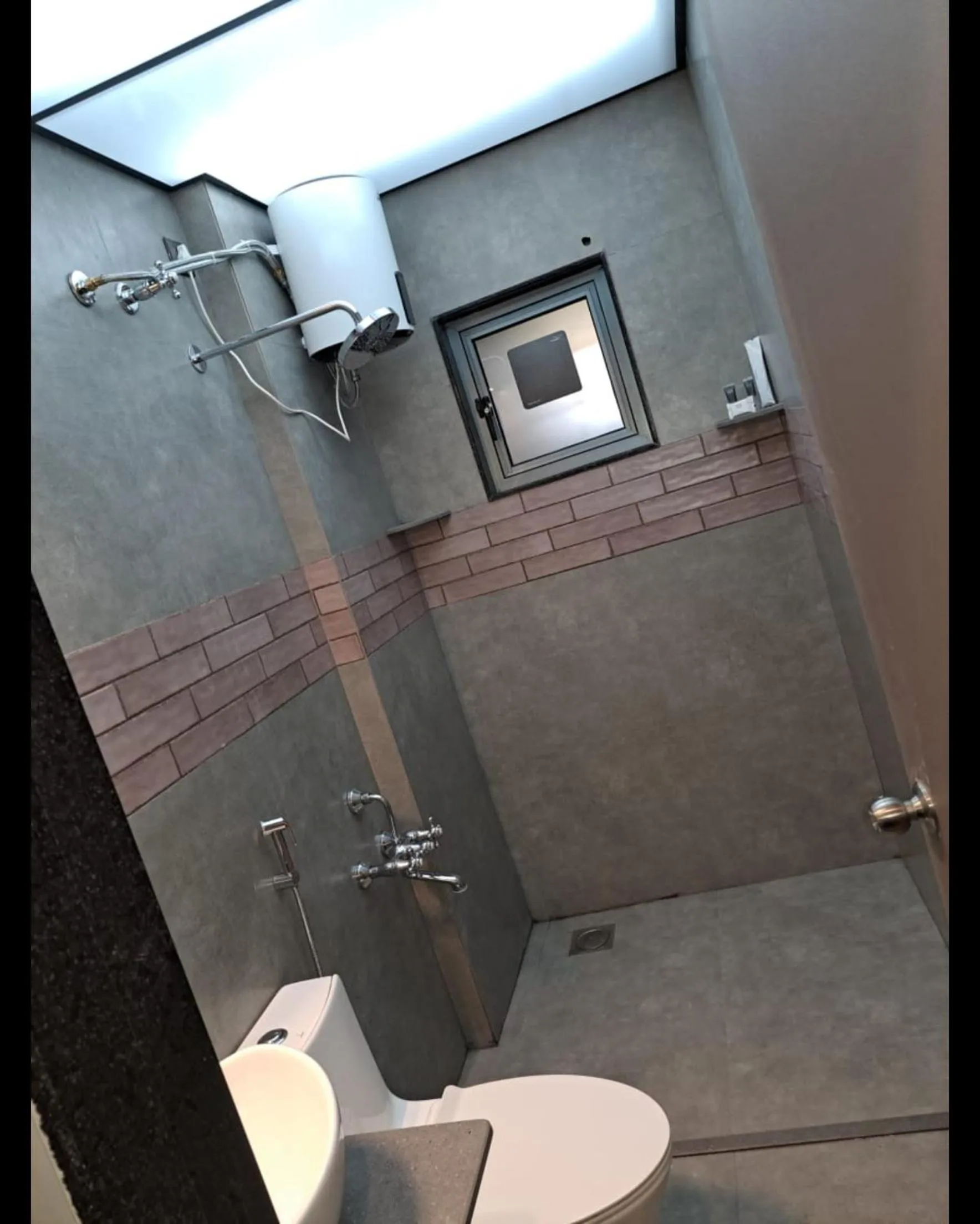 Shower in Sai Celebrations Inn Shirdi