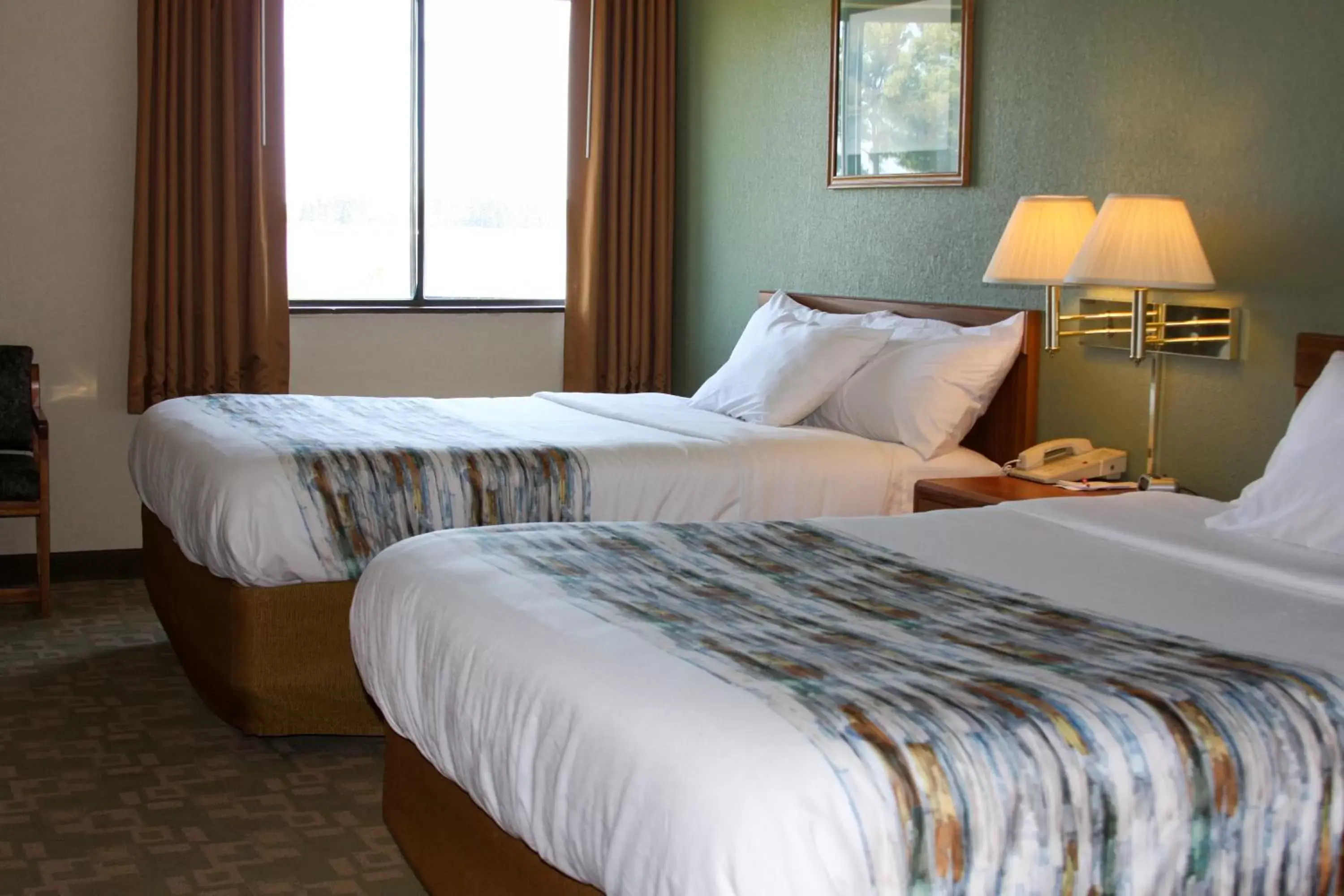 Bed in Barkers Island Inn Resort & Conference Center