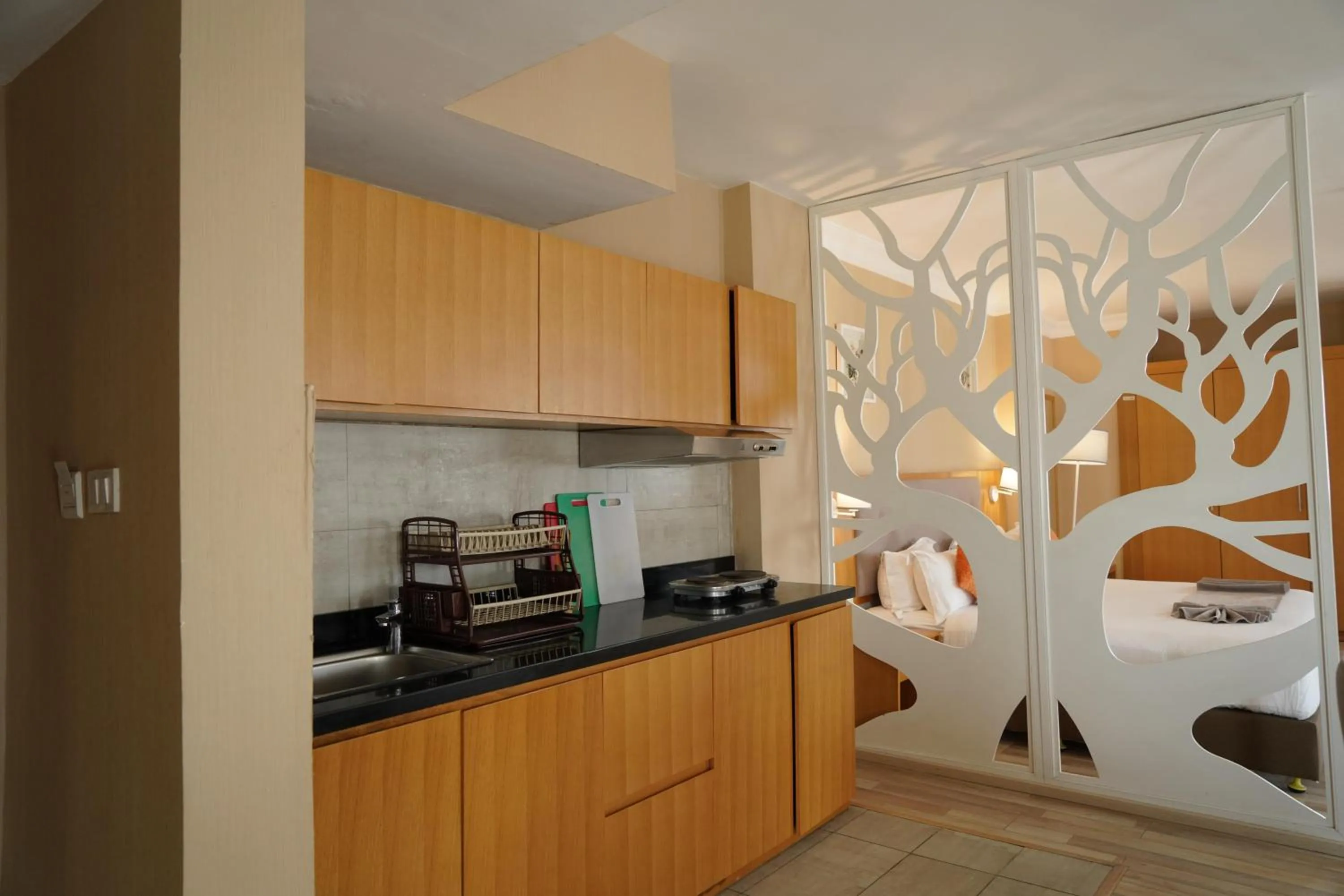 Kitchen or kitchenette in Mado Hotel