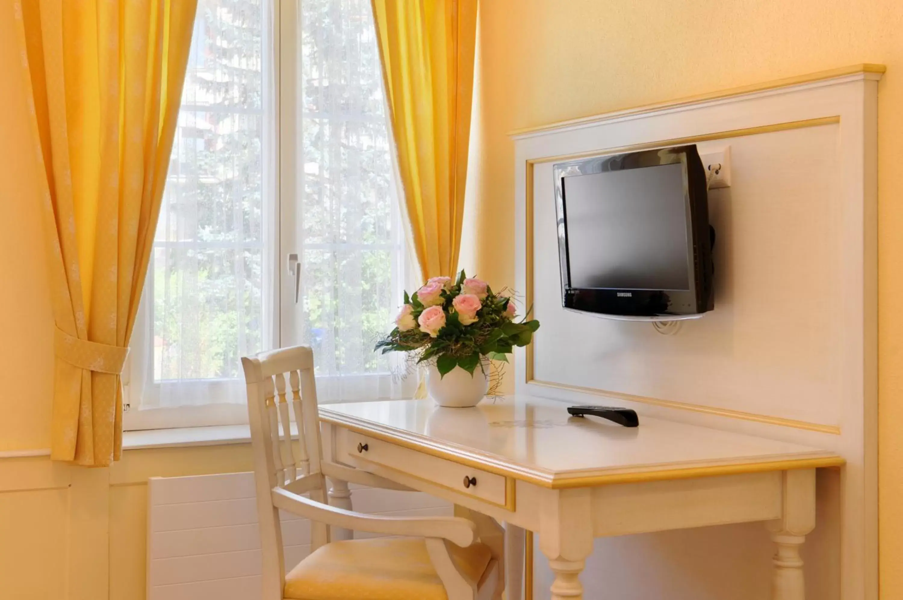 Photo of the whole room, TV/Entertainment Center in Seehof Hotel Du Lac