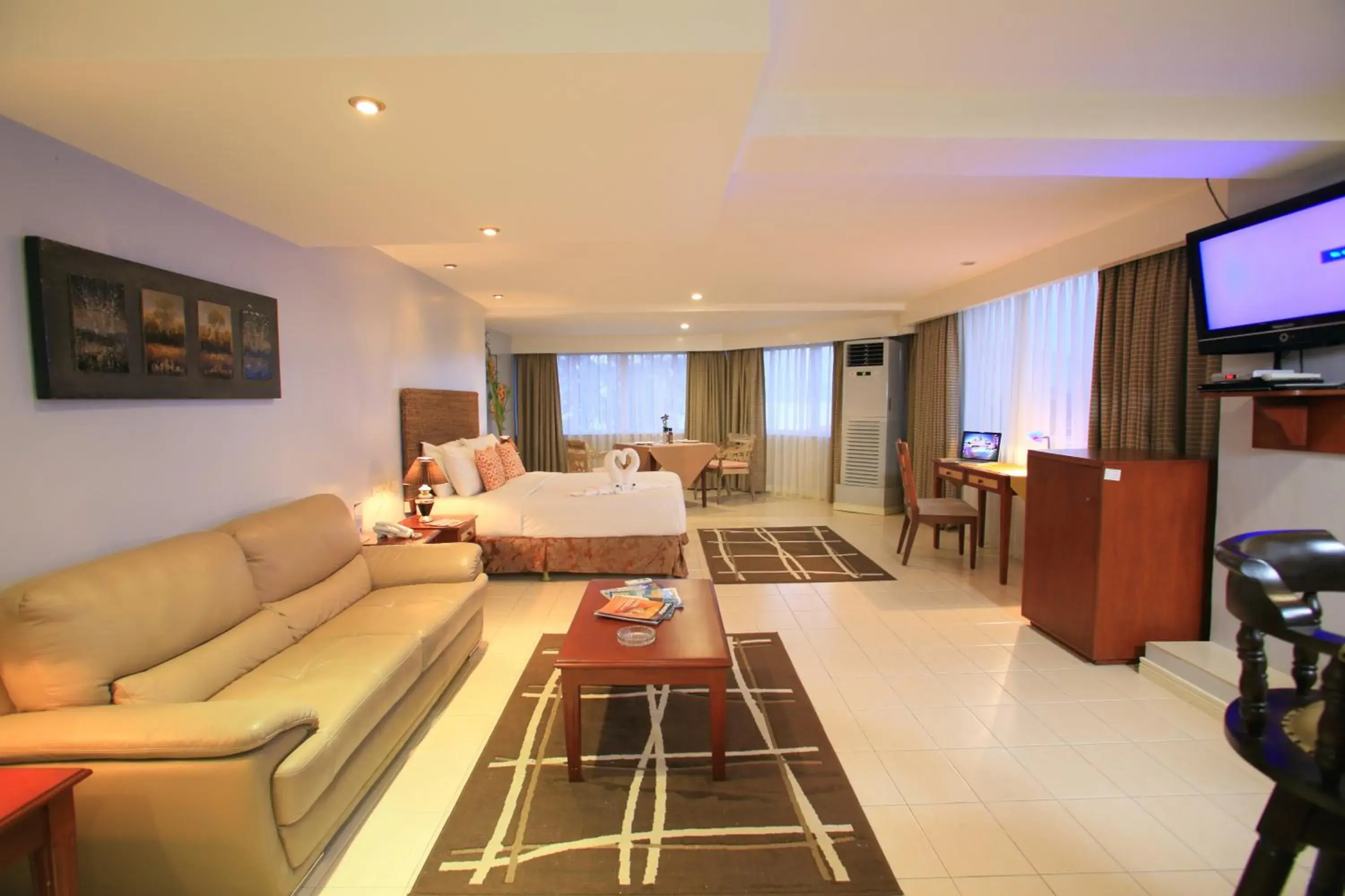 Living room, Seating Area in Wild Orchid Beach Resort