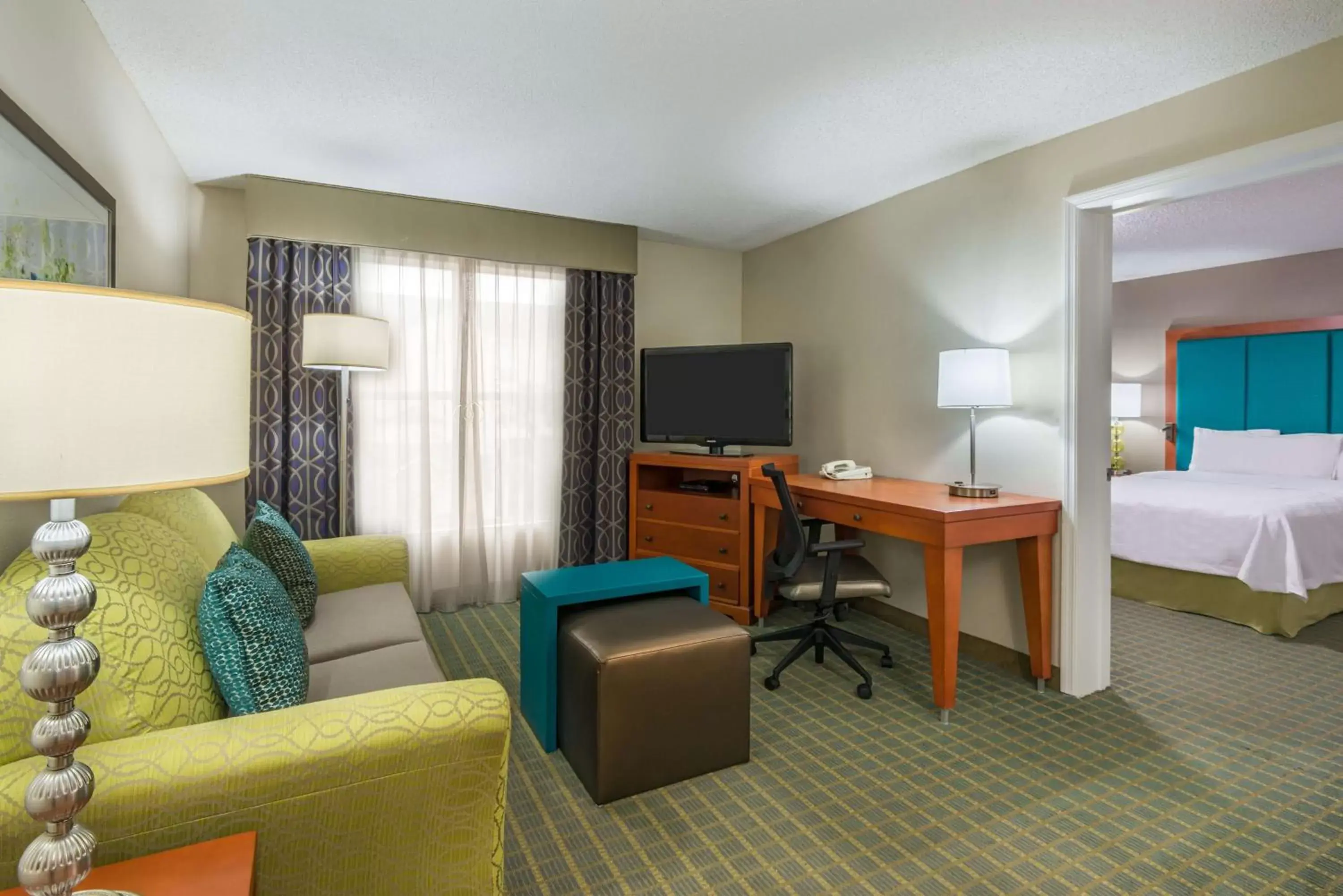 Bedroom, TV/Entertainment Center in Homewood Suites by Hilton Orlando-Nearest to Universal Studios