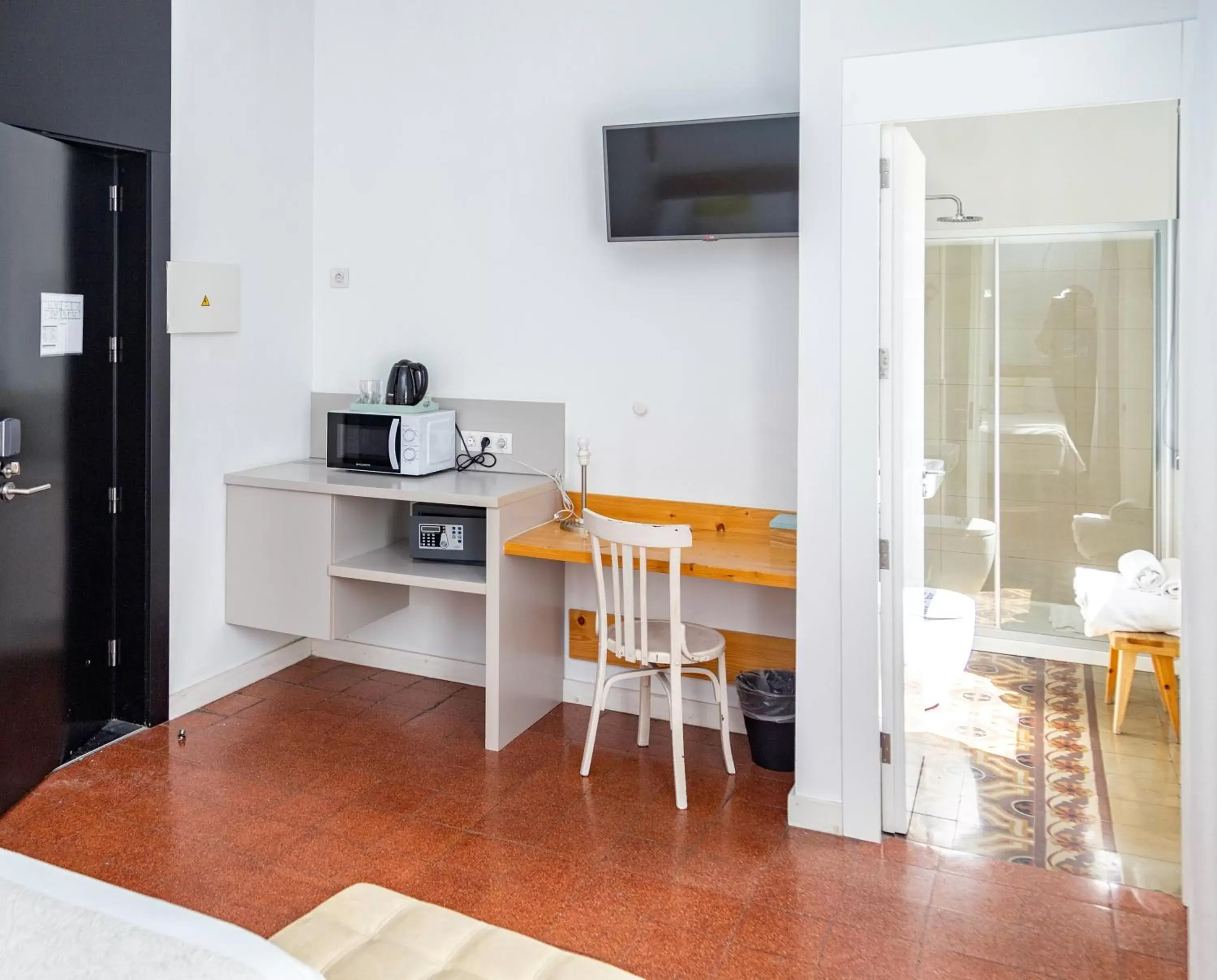 Bathroom, TV/Entertainment Center in Bed and Chic