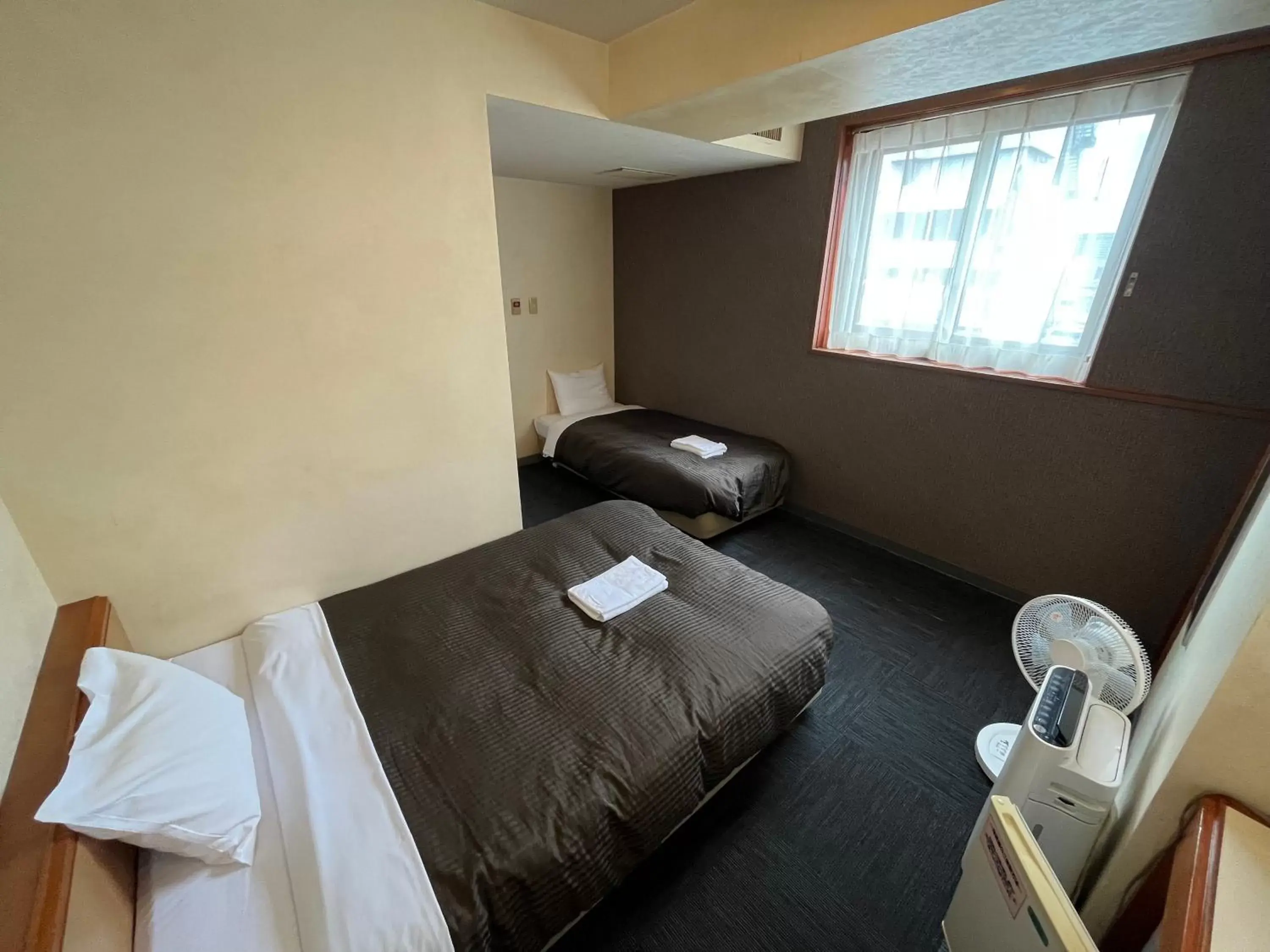 Bedroom, Bed in Hotel Axia Inn Kushiro