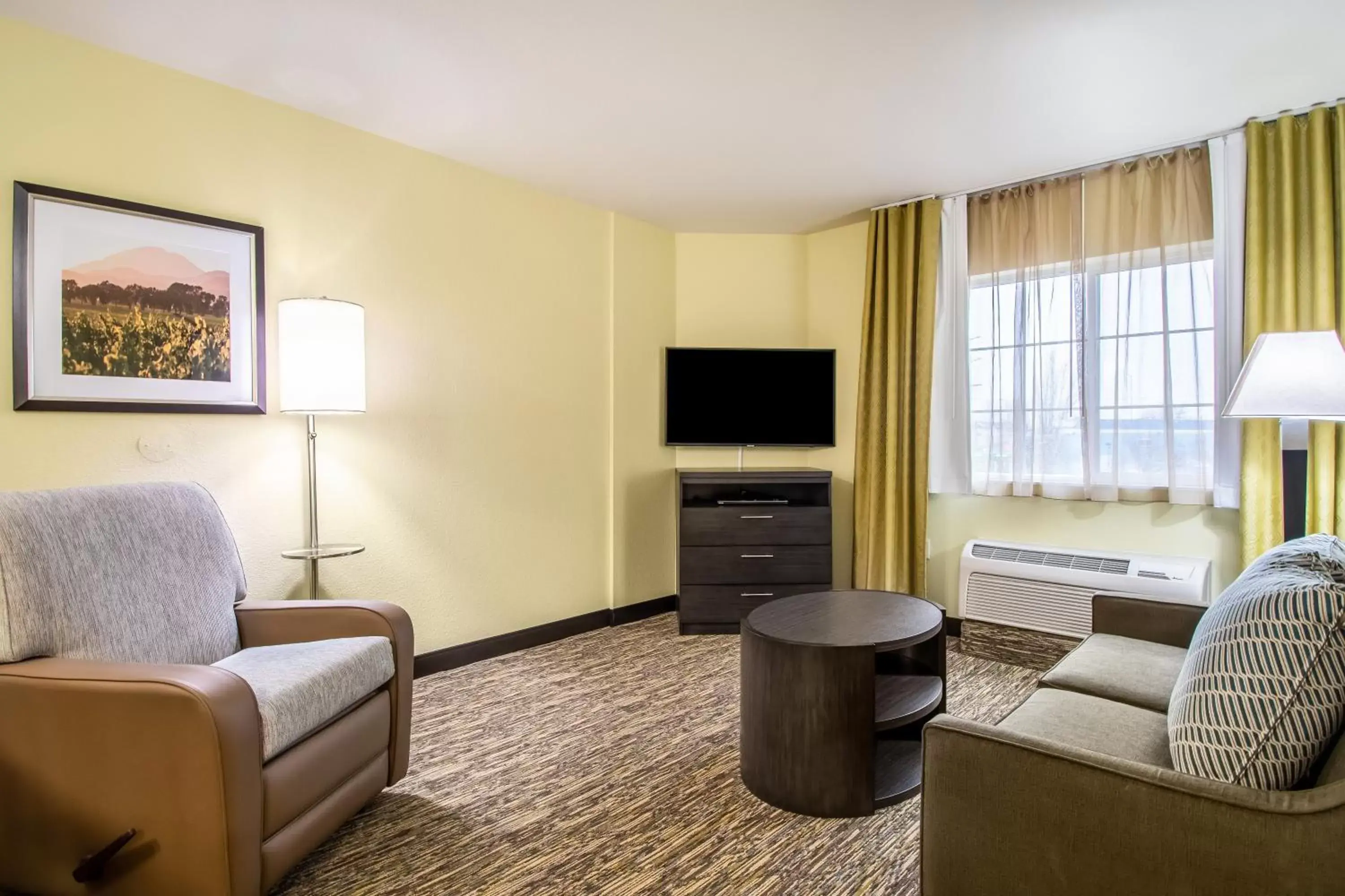 Bedroom, Seating Area in Candlewood Suites Portland Airport, an IHG Hotel