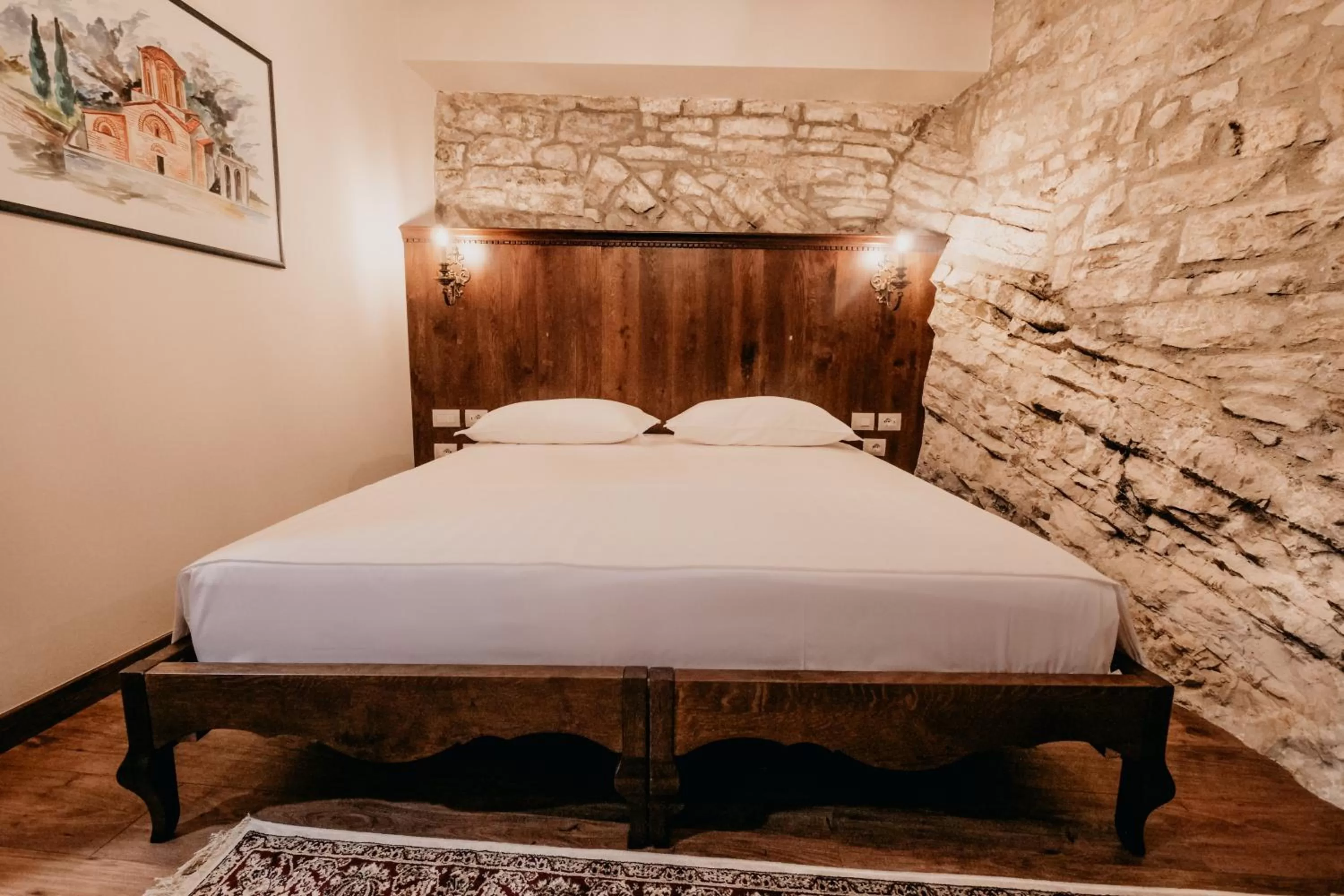 Bed in Beratino Hotel