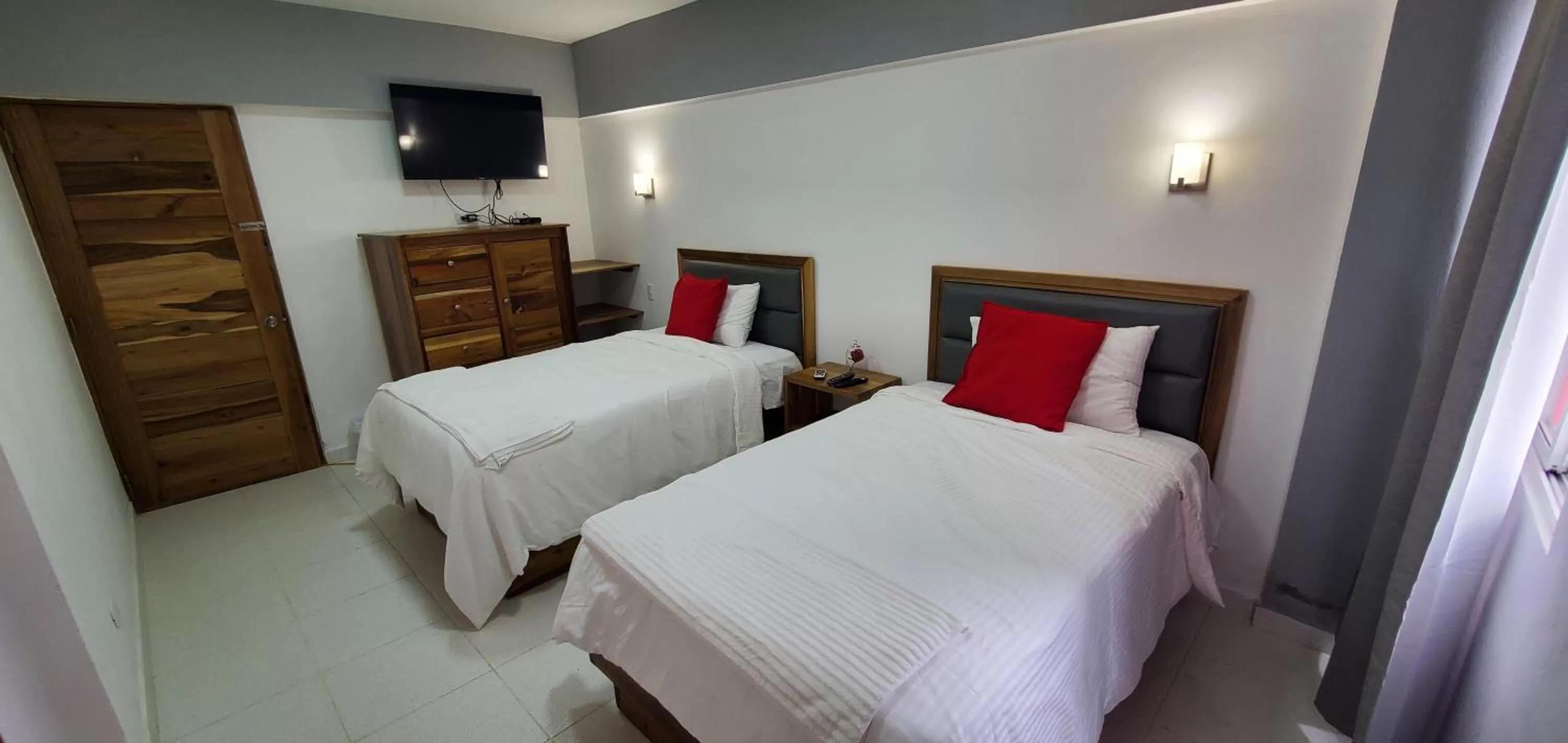 Bed in Boca Grande Hotel Suites