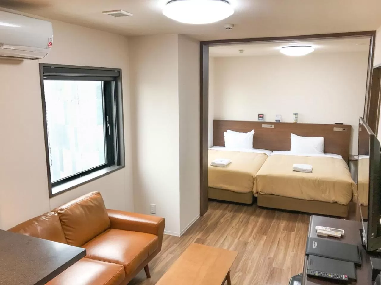 Bed in HOTEL LiVEMAX BUDGET Nagoya Shinkansen-guchi