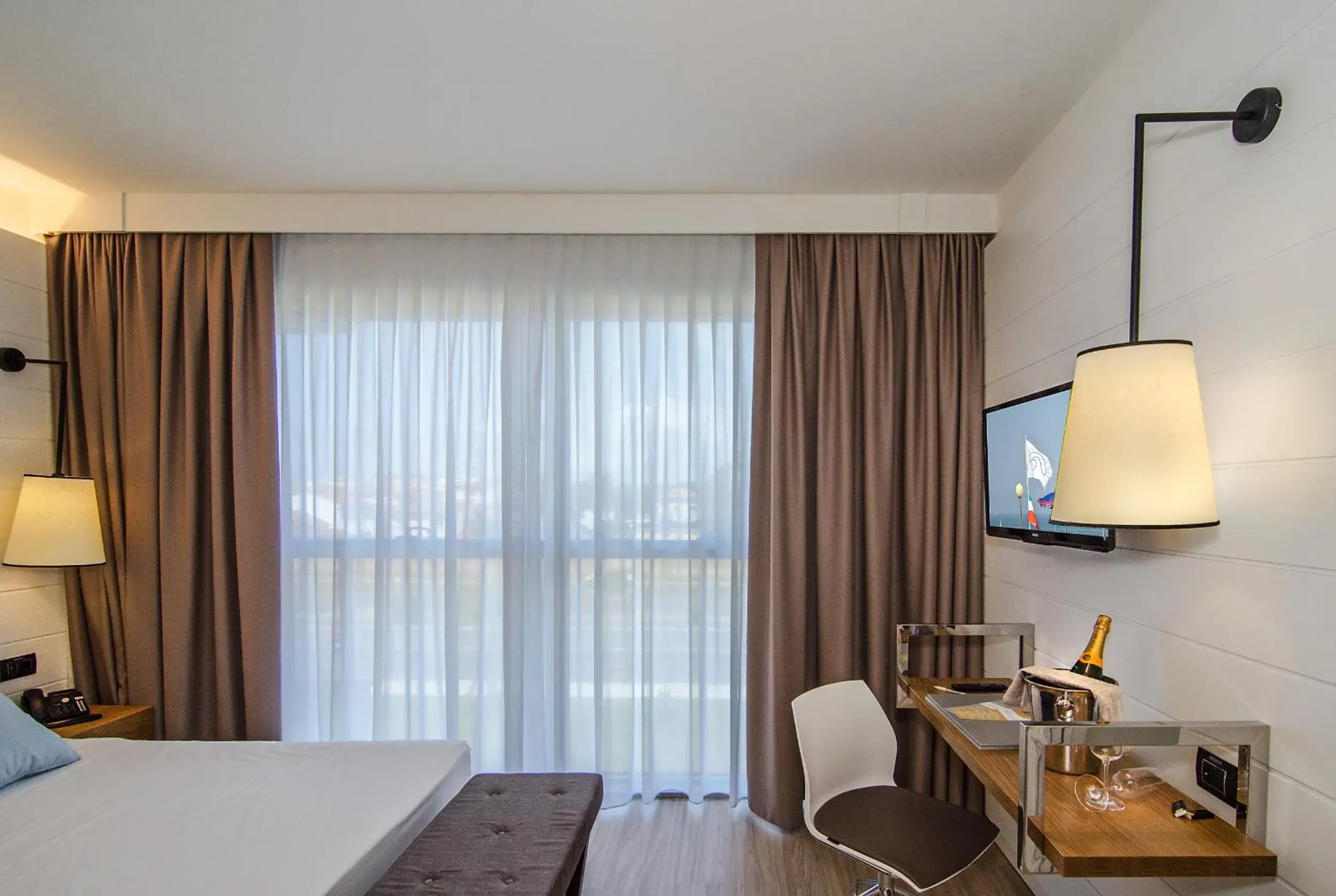 TV and multimedia, TV/Entertainment Center in Hotel Viareggio