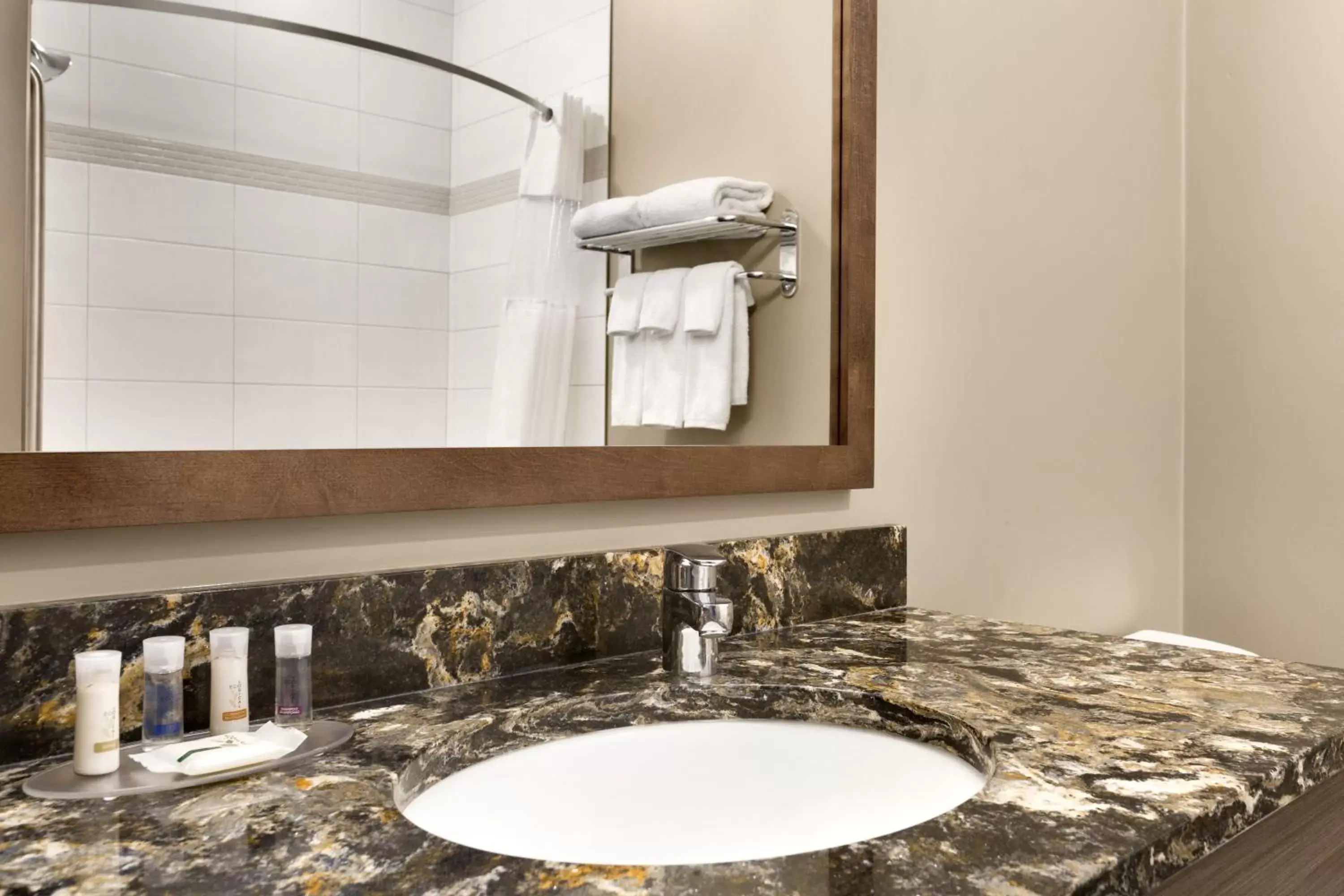 Shower, Bathroom in Days Inn & Suites by Wyndham Warman Legends Centre