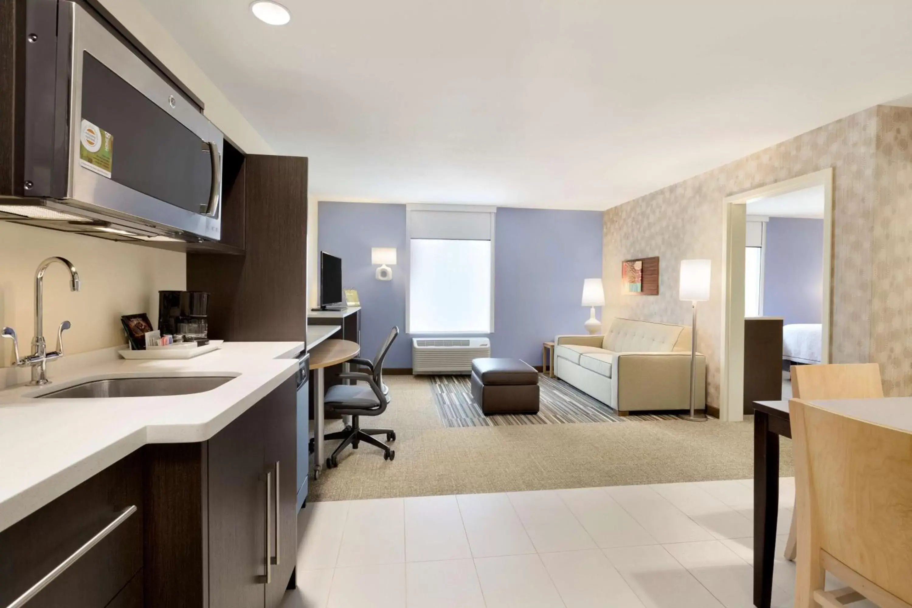 Living room, Kitchen/Kitchenette in Home2 Suites by Hilton Houston Willowbrook