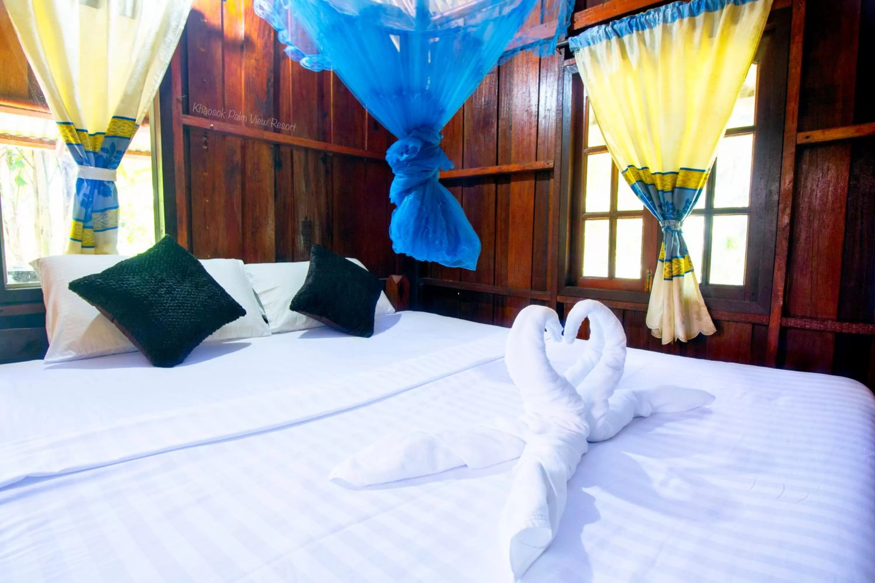 Bed in Khao Sok Palmview Resort
