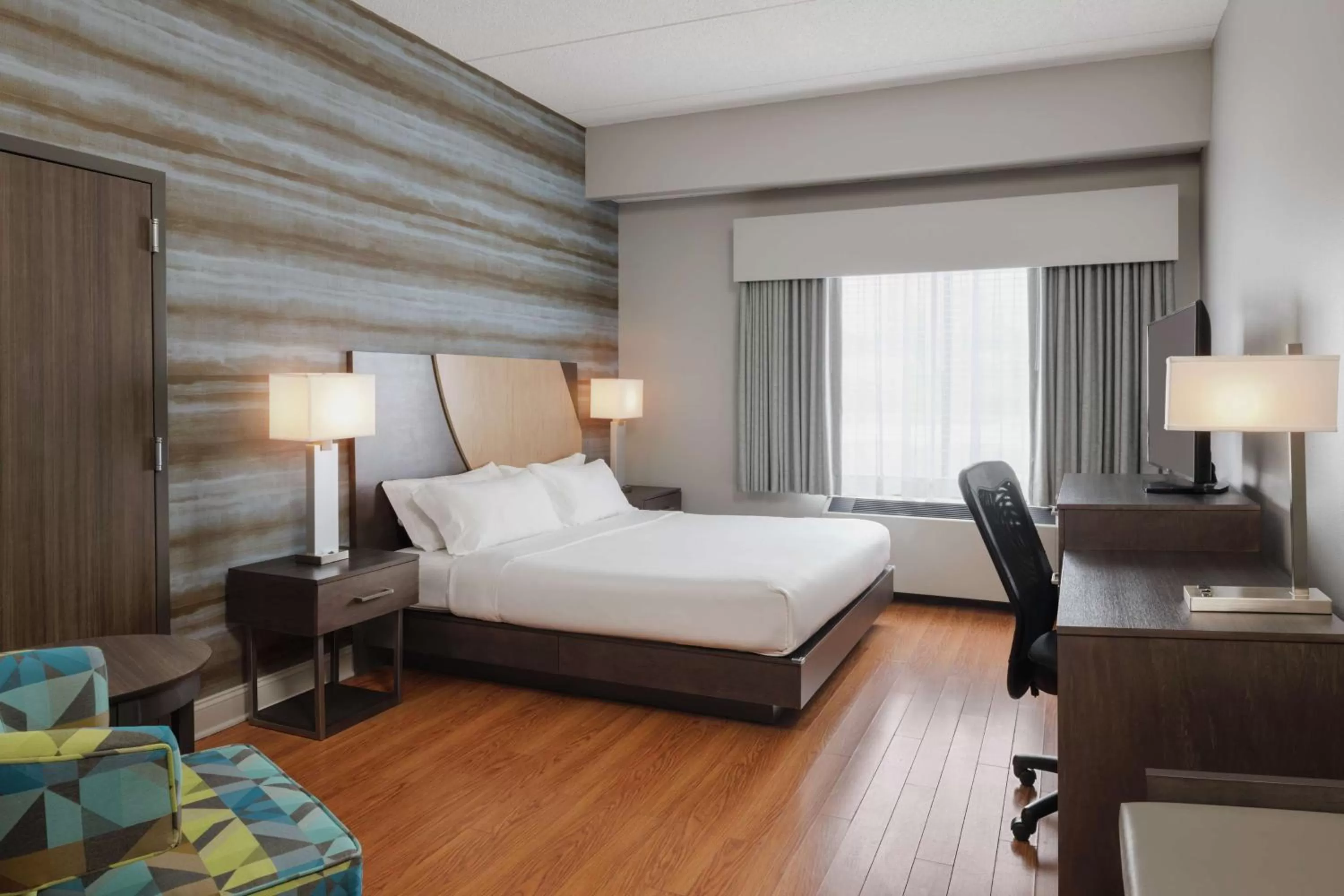 Bed in Hotel Trilogy Albany Airport, Tapestry Collection by Hilton