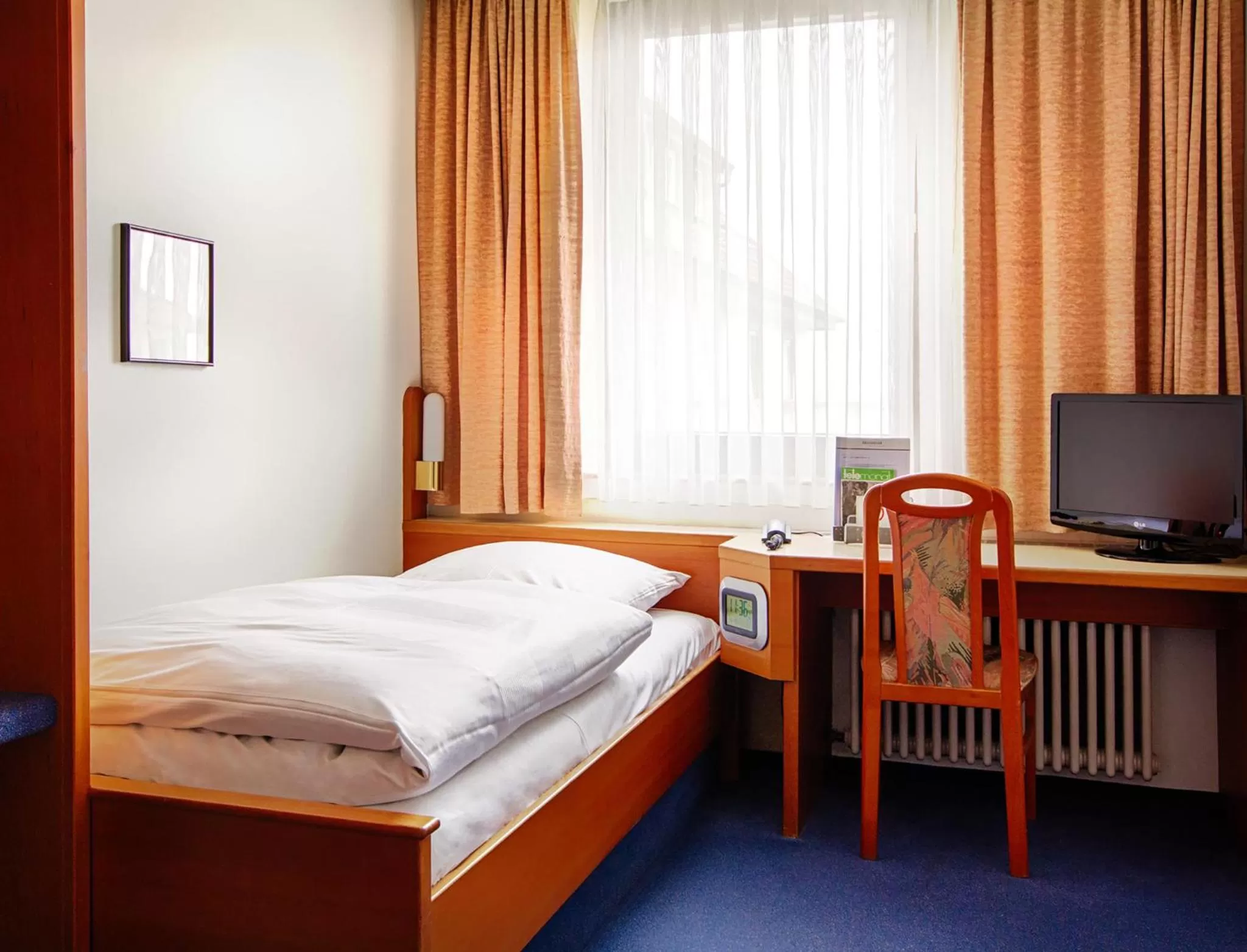 Photo of the whole room, Bed in Seligweiler Hotel & Restaurant