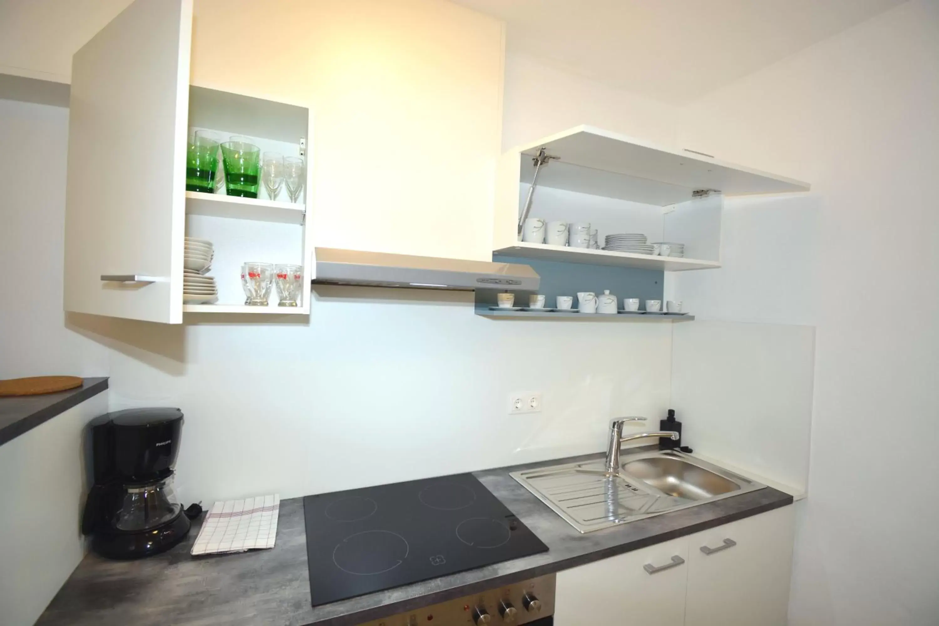 Kitchen or kitchenette, Kitchen/Kitchenette in Landhotel Post Ebensee am Traunsee ***S
