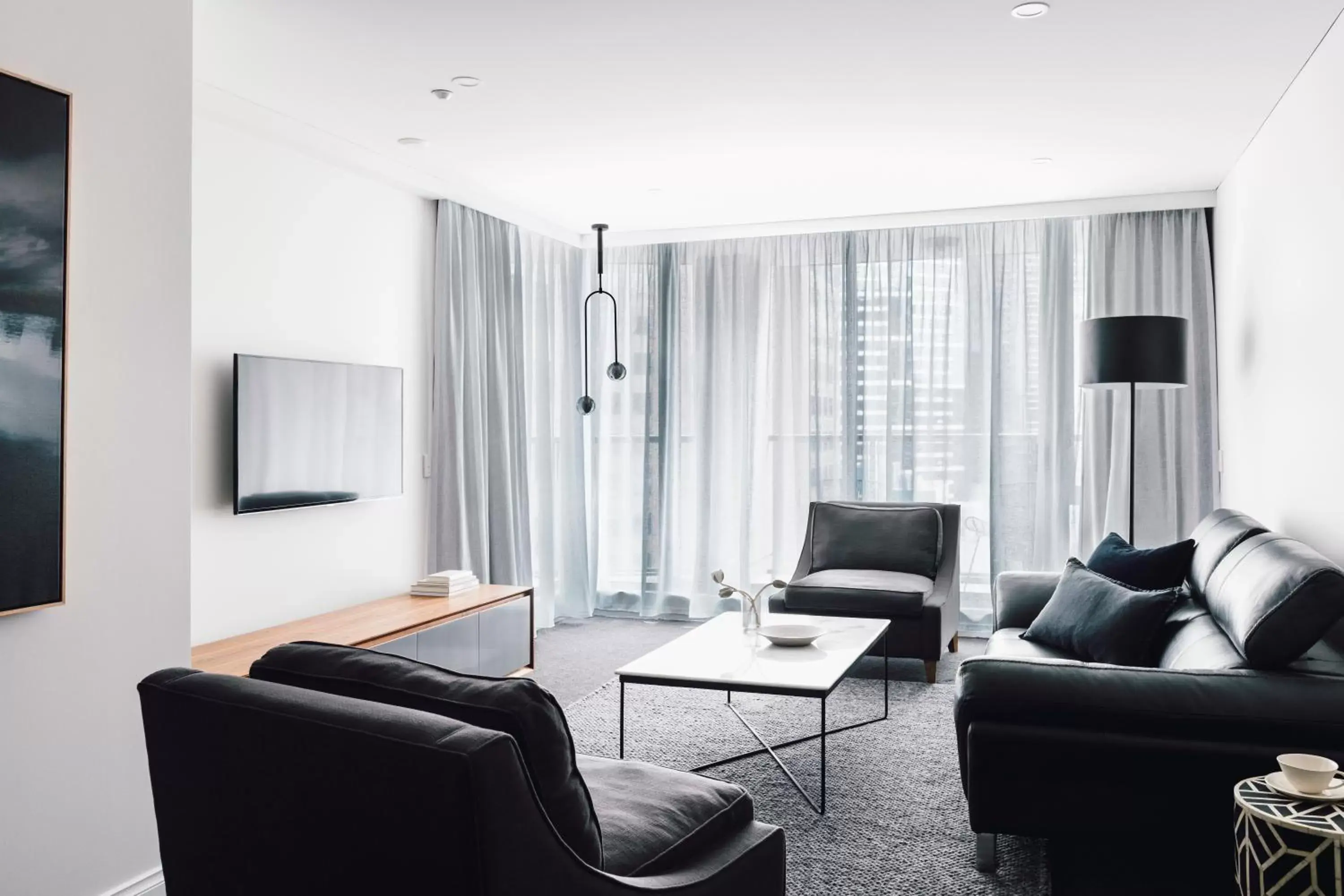 Living room, Seating Area in Quay West Suites Melbourne