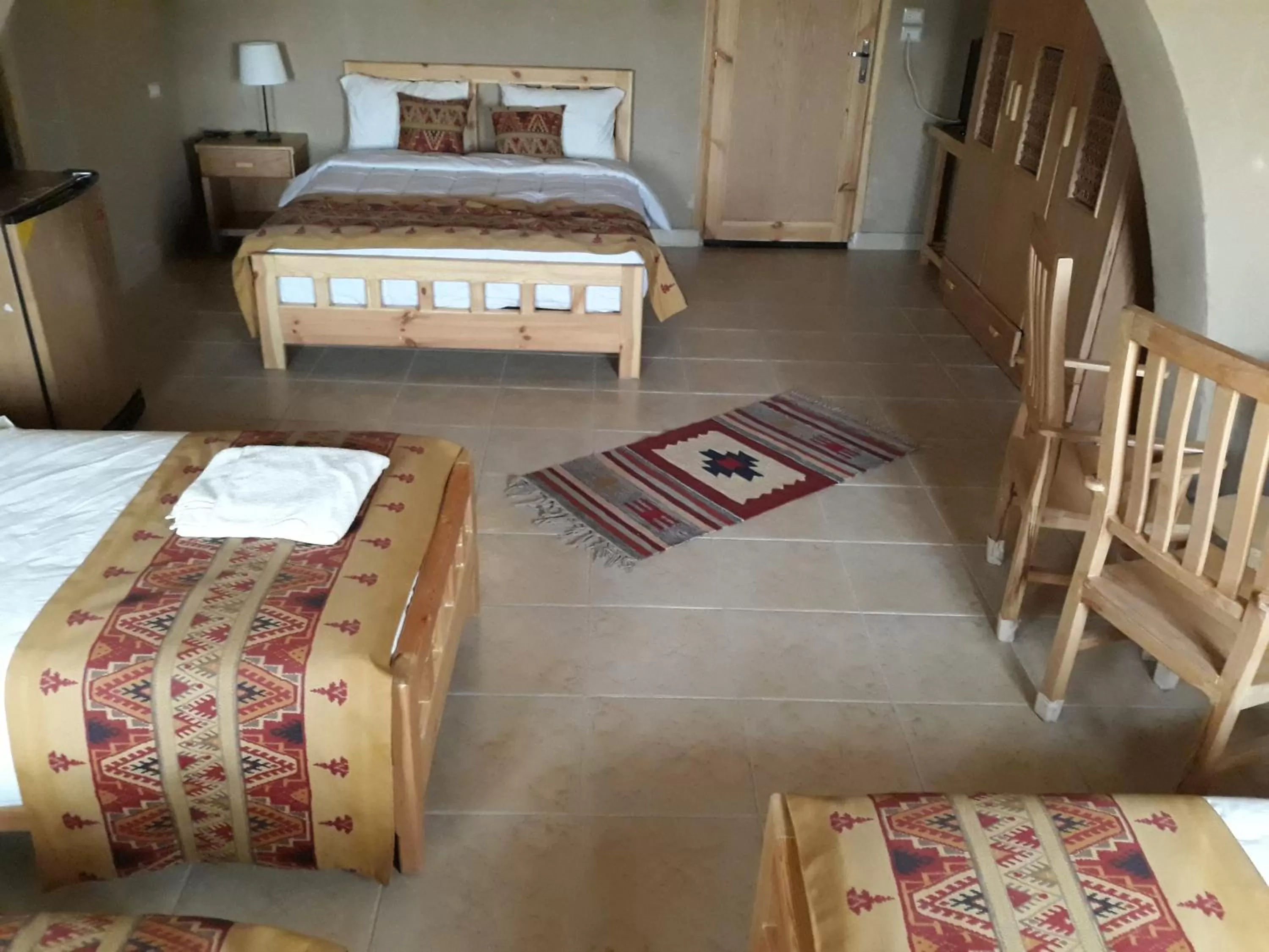 Bed in Embrace Hotel