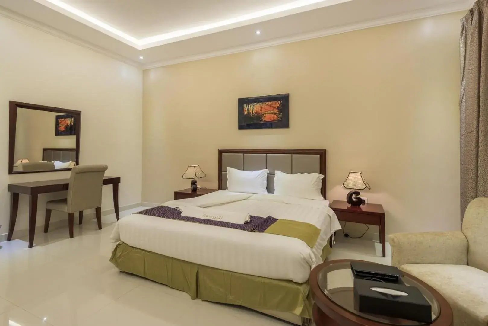 Bed in Taleen Al Nakheel Apartment