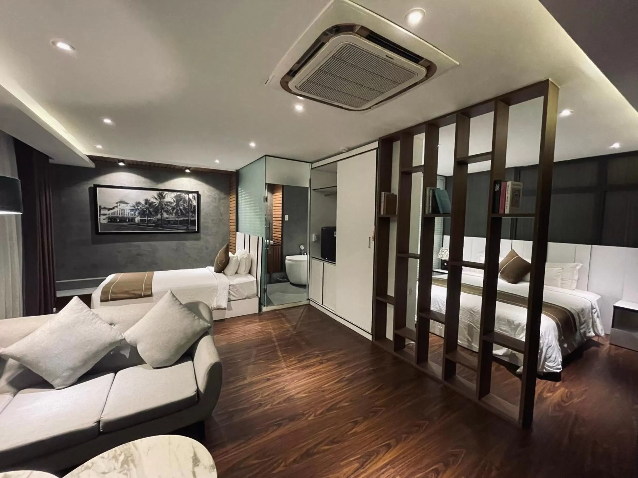 Living room, Bed in KP Hotel