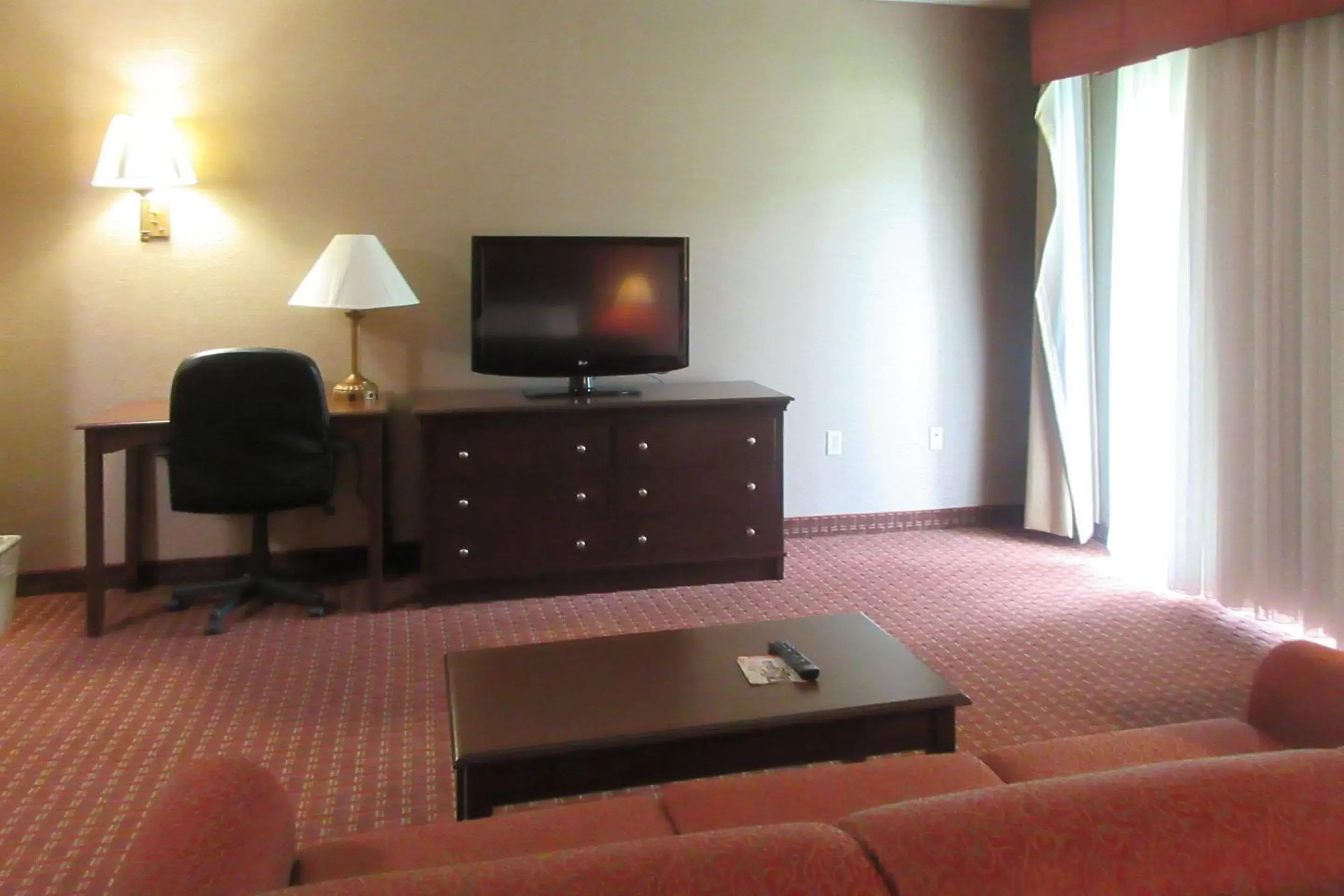 Photo of the whole room, TV/Entertainment Center in Quality Inn & Suites Owego