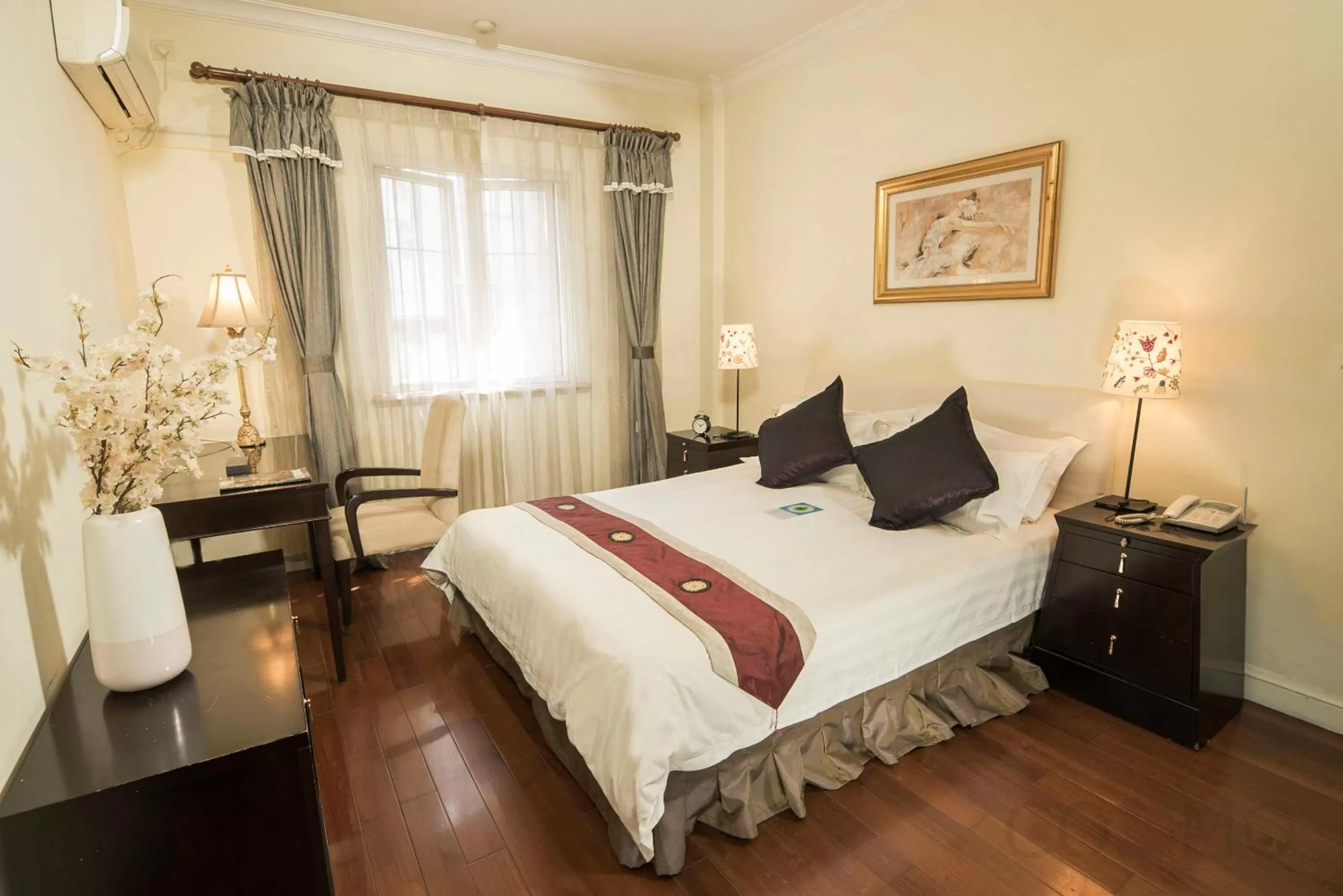 Bed in Ladoll Service Apartments