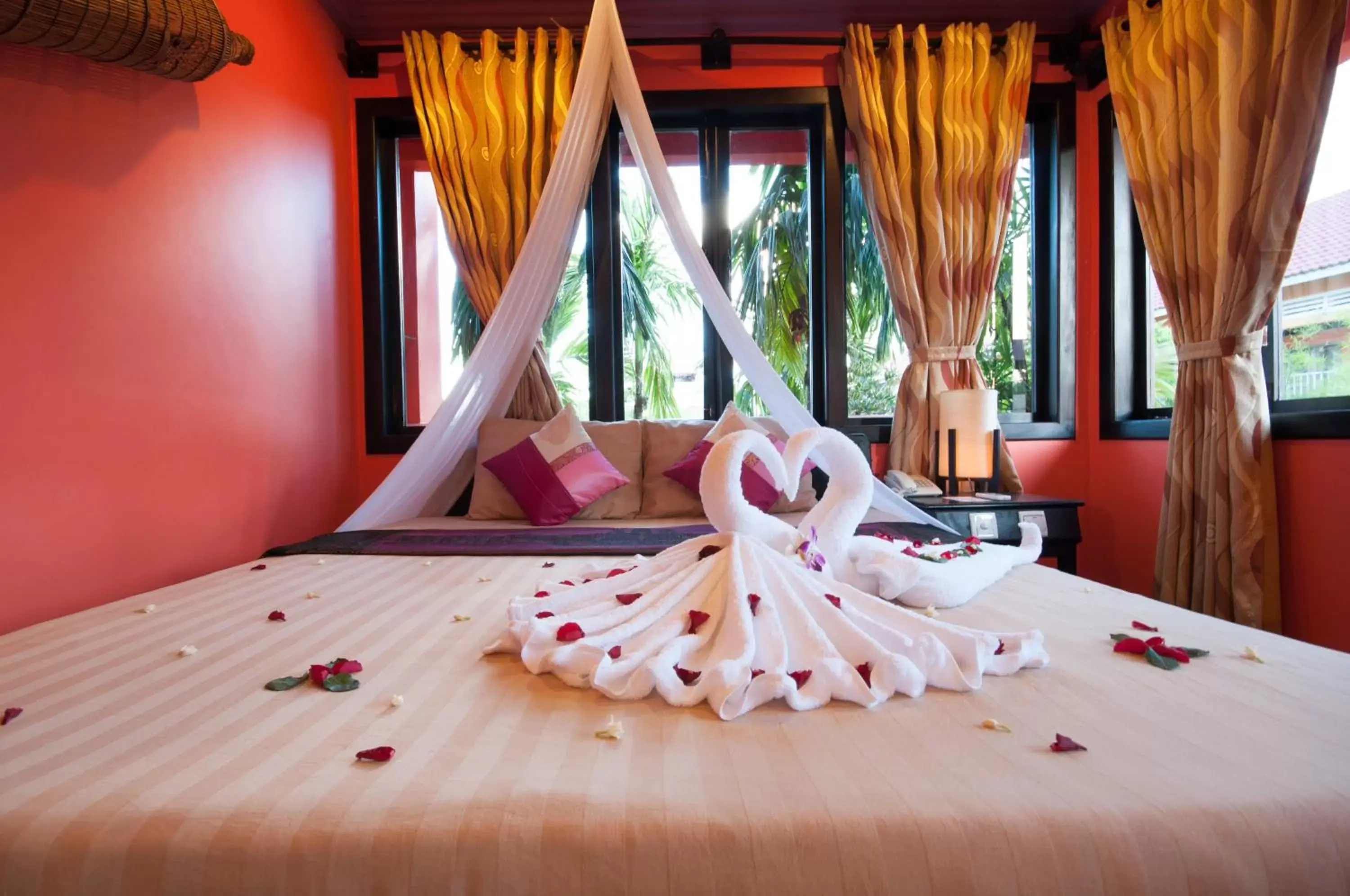 Bed in Golden Butterfly Villa