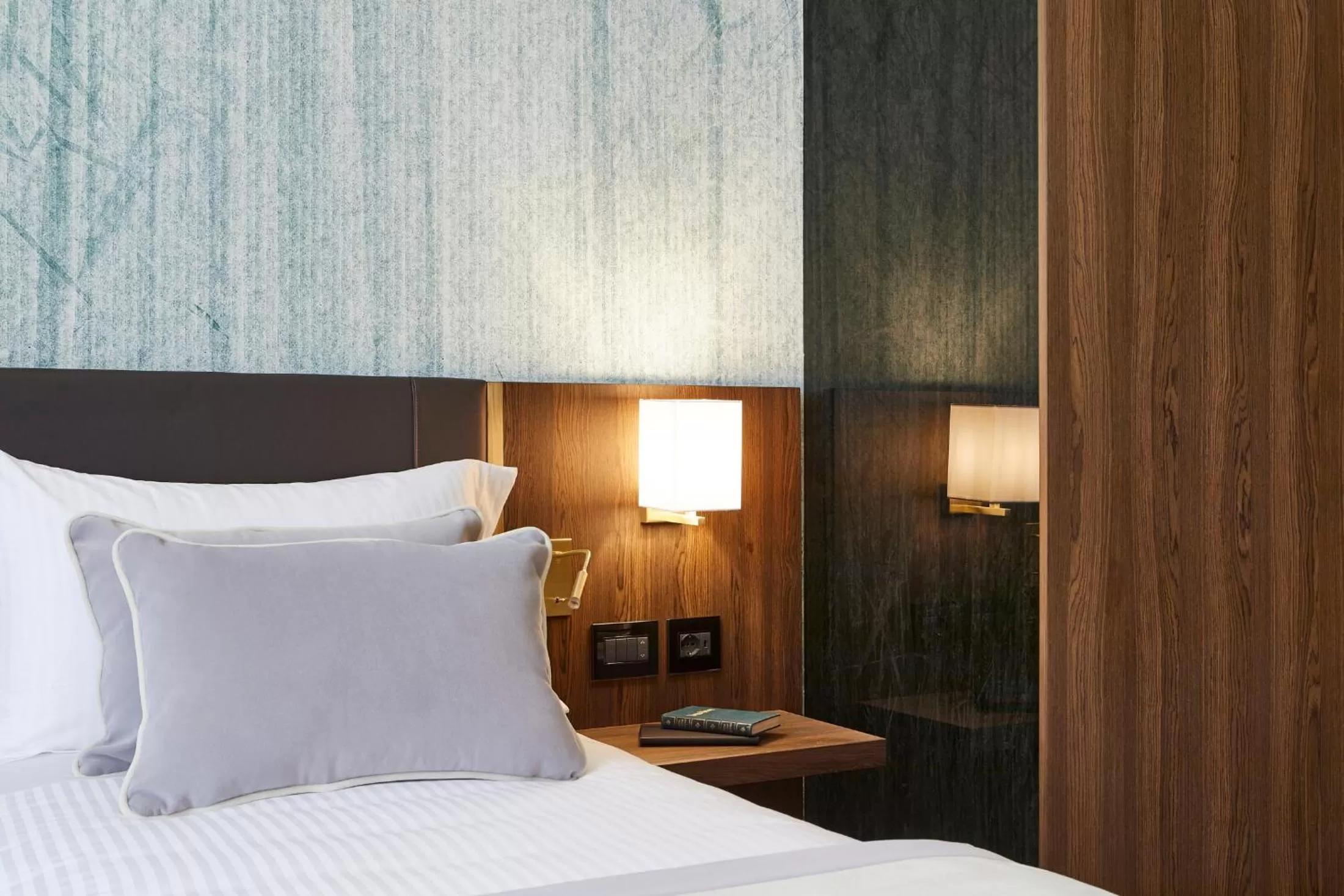 Bed in Messori Suites