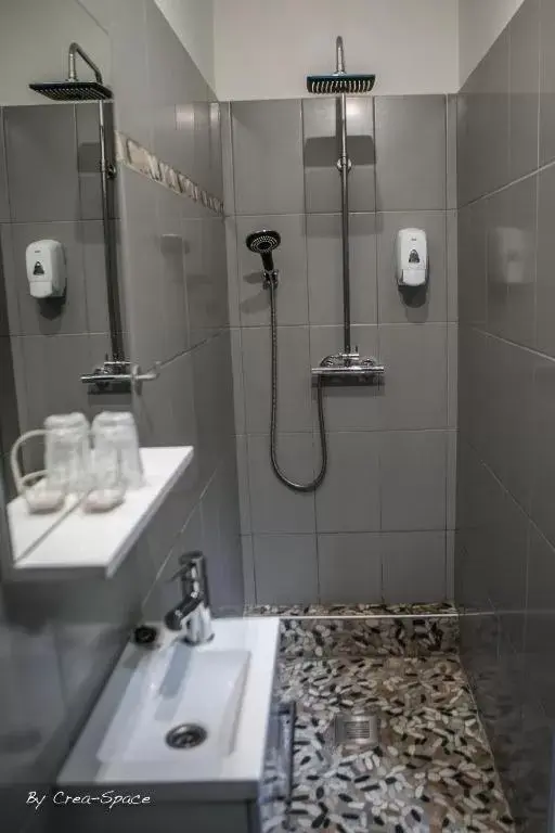 Shower, Bathroom in Logis Hotel La Tourelle du Beffroi