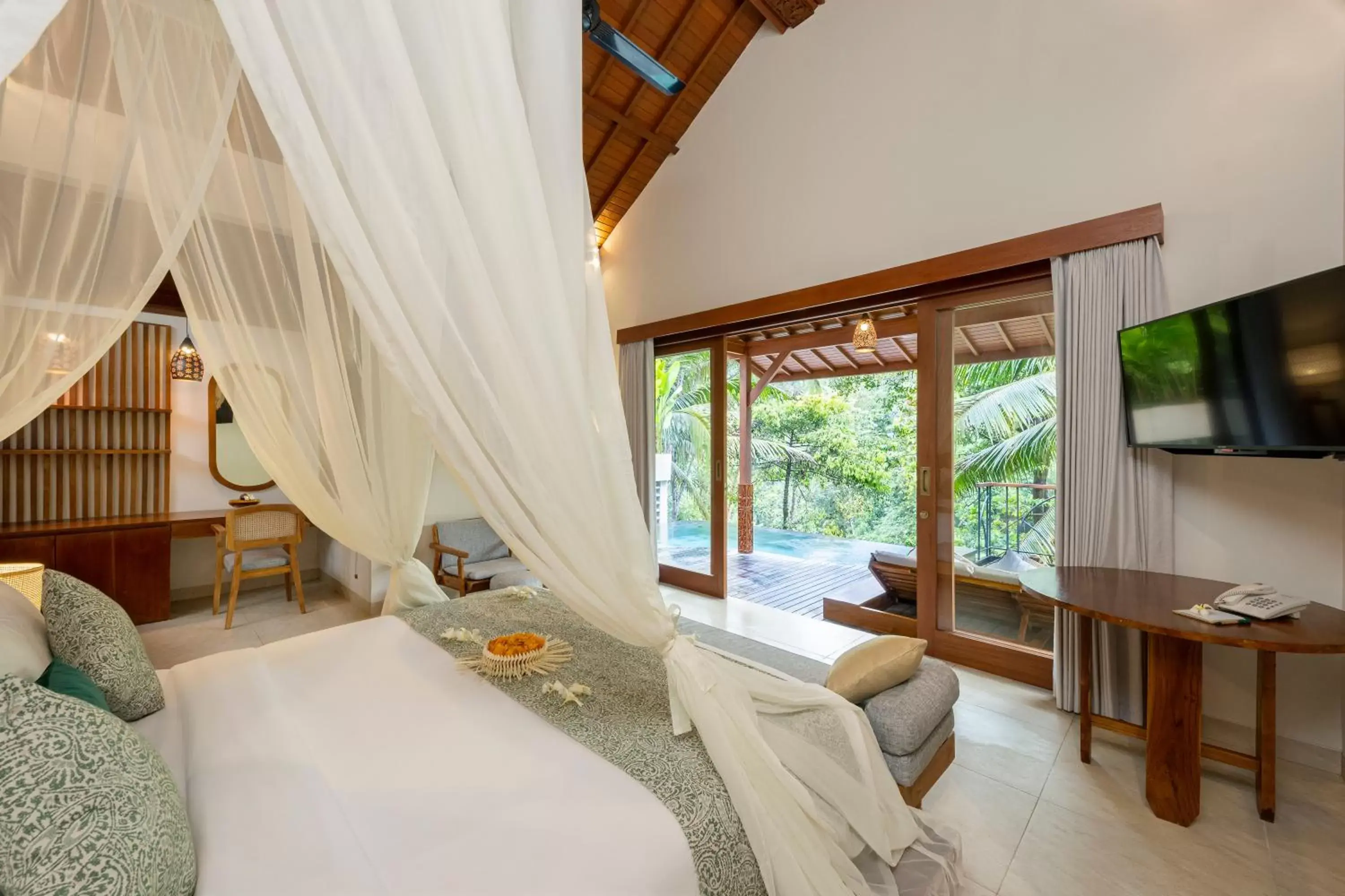 Bed in Jannata Resort and Spa