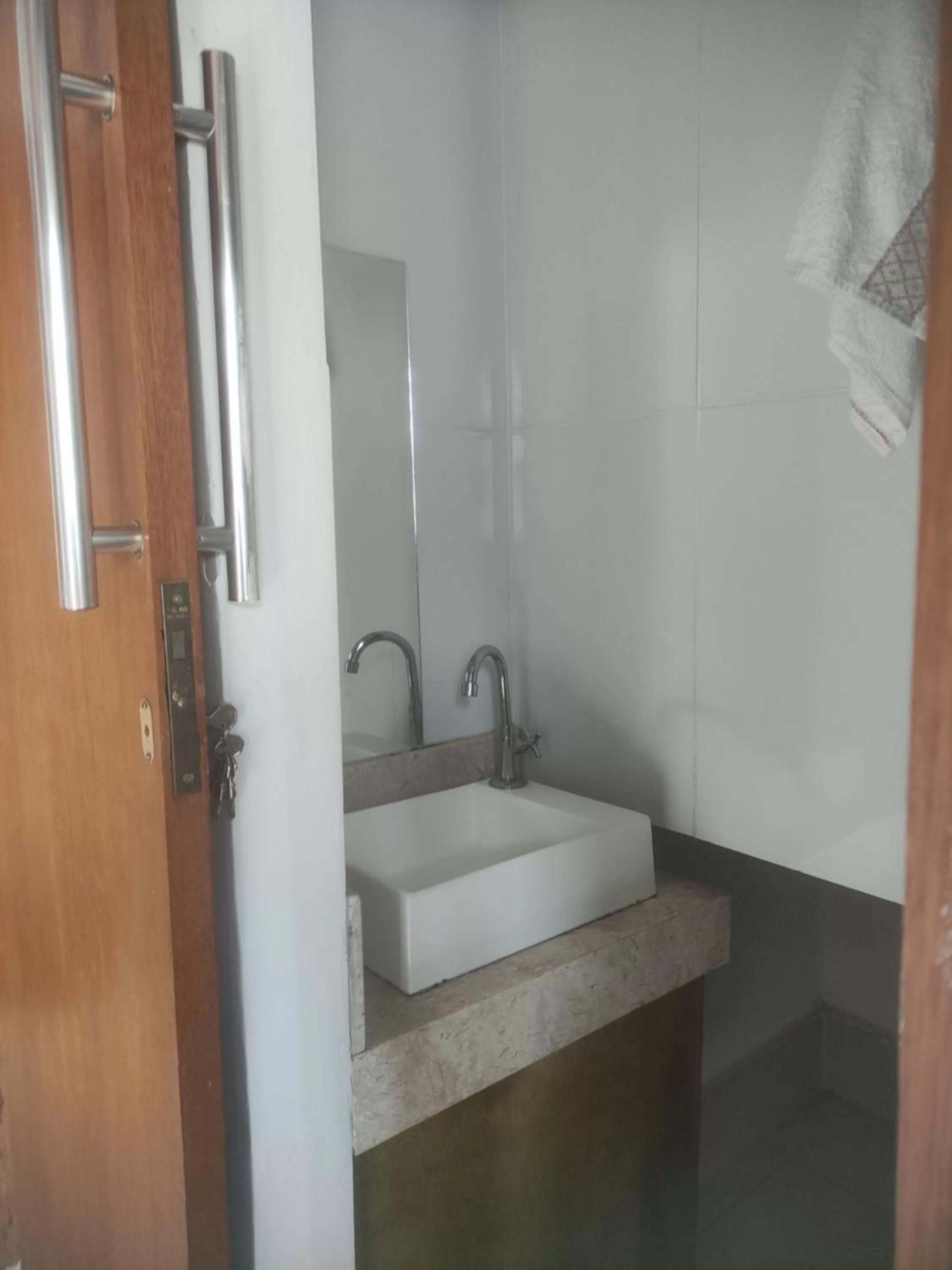 Bathroom in Pousada da Gi Suítes e Turismo