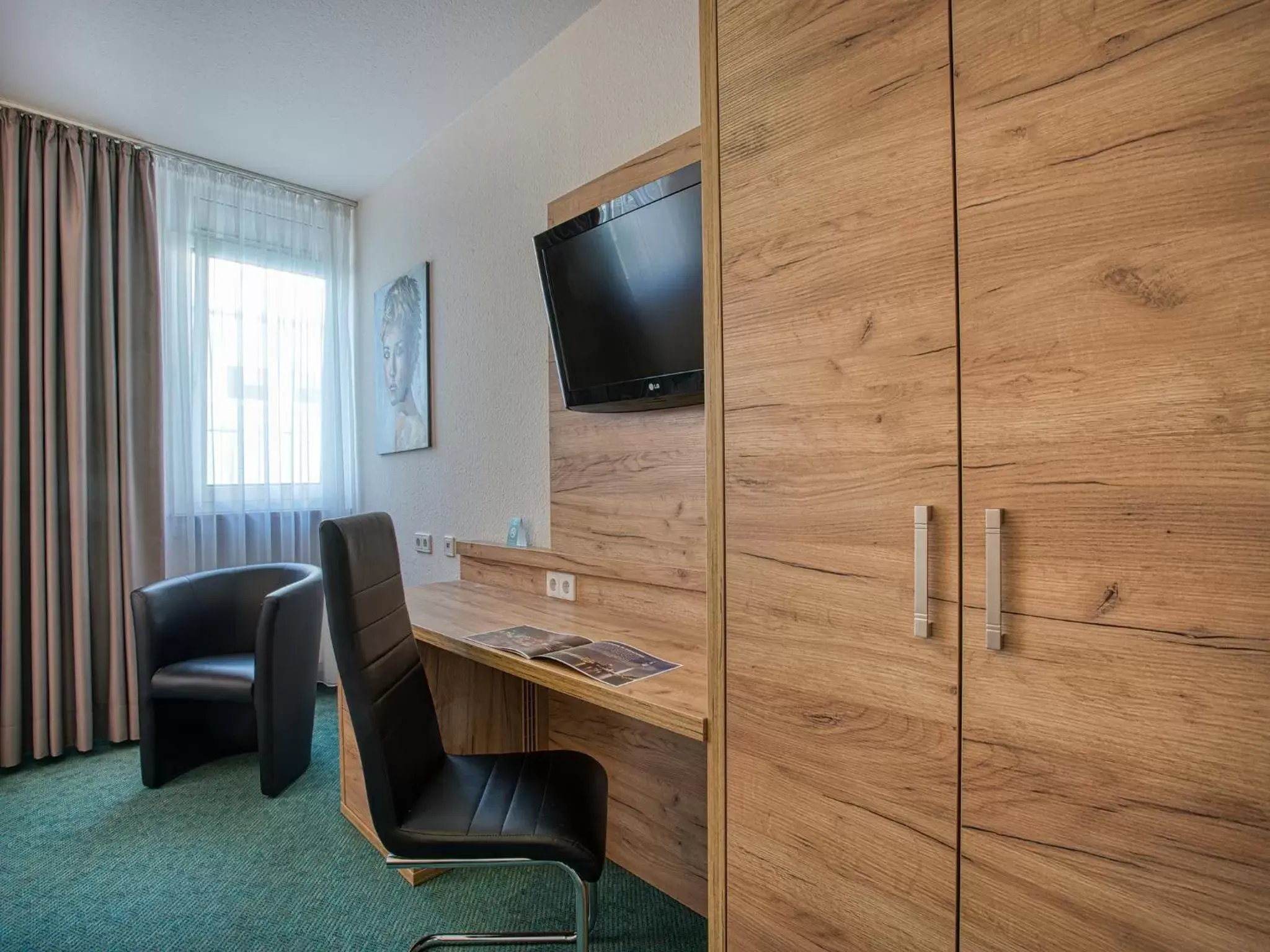 Seating area, TV/Entertainment Center in Centro Hotel Böblingen