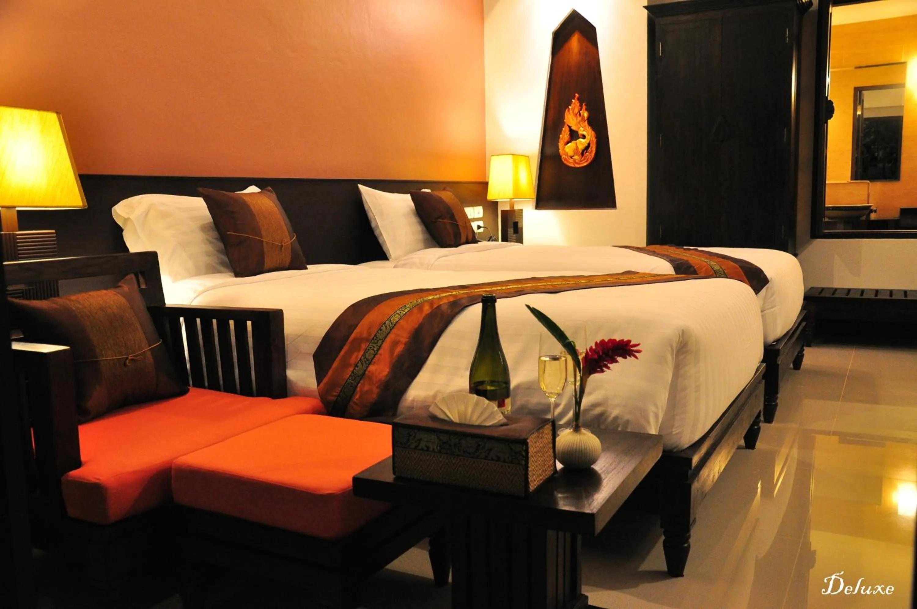 Bed in Navatara Phuket Resort