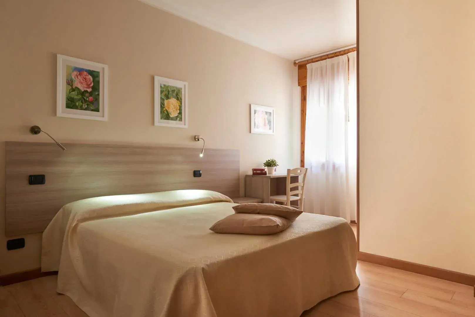 Bed in Albergo Romagnolo