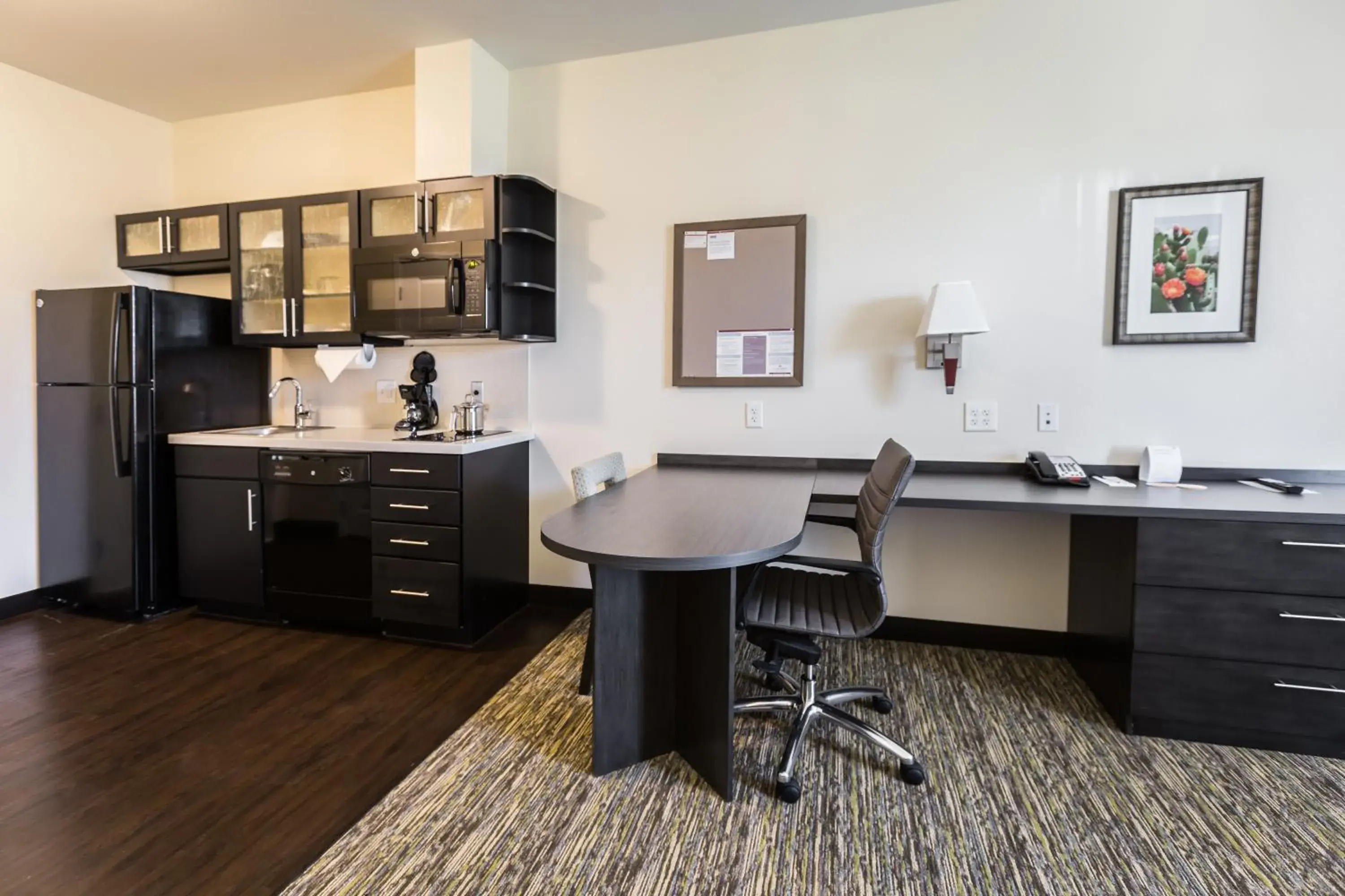 Photo of the whole room, Kitchen/Kitchenette in Candlewood Suites - Buda - Austin SW, an IHG Hotel