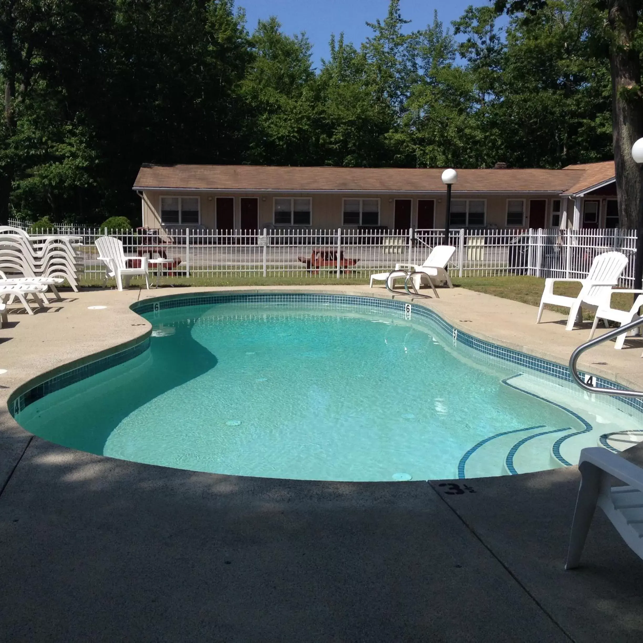 Swimming pool, Property Building in Marcotte Motor Court
