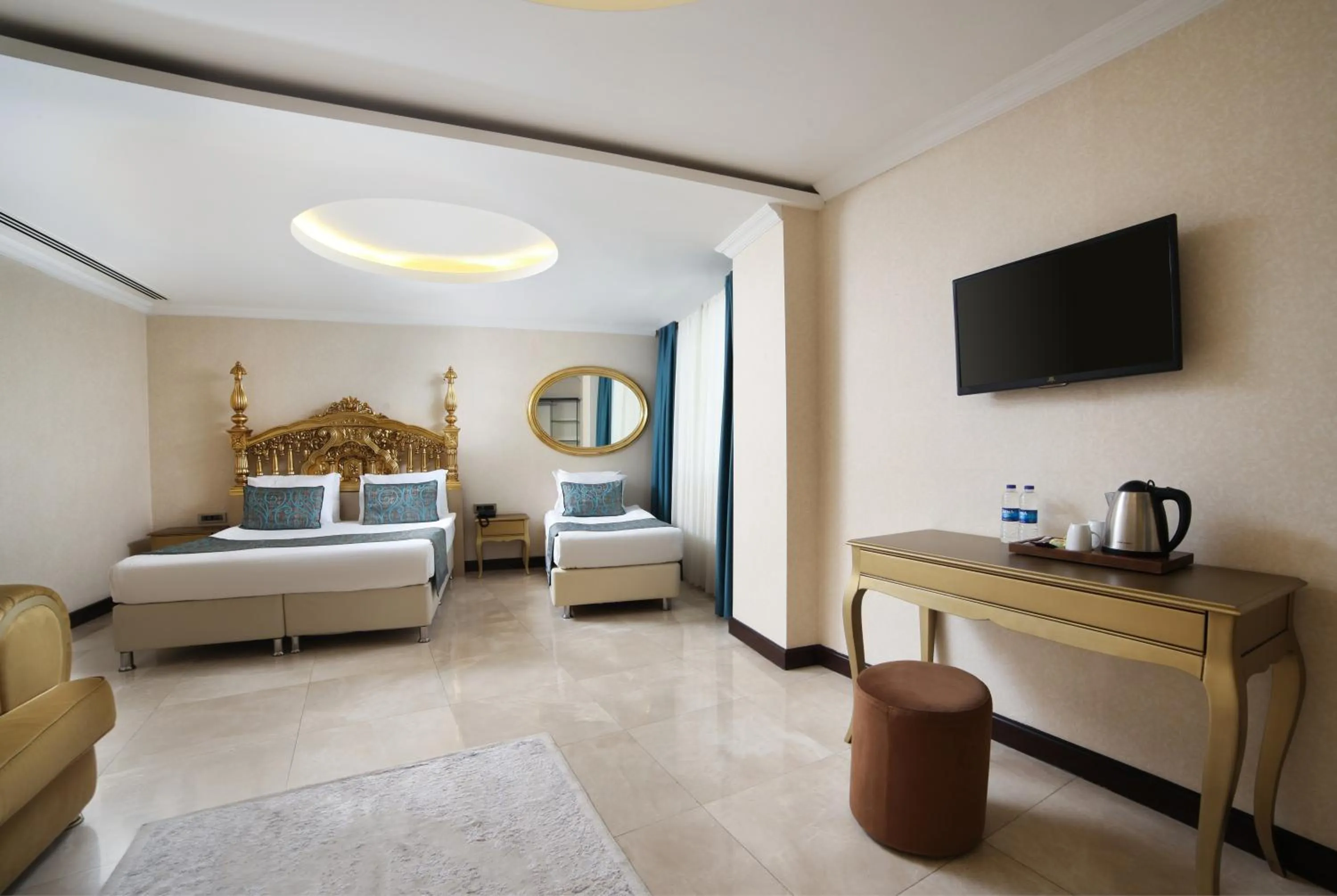 Photo of the whole room, TV/Entertainment Center in Great Fortune Hotel & Spa