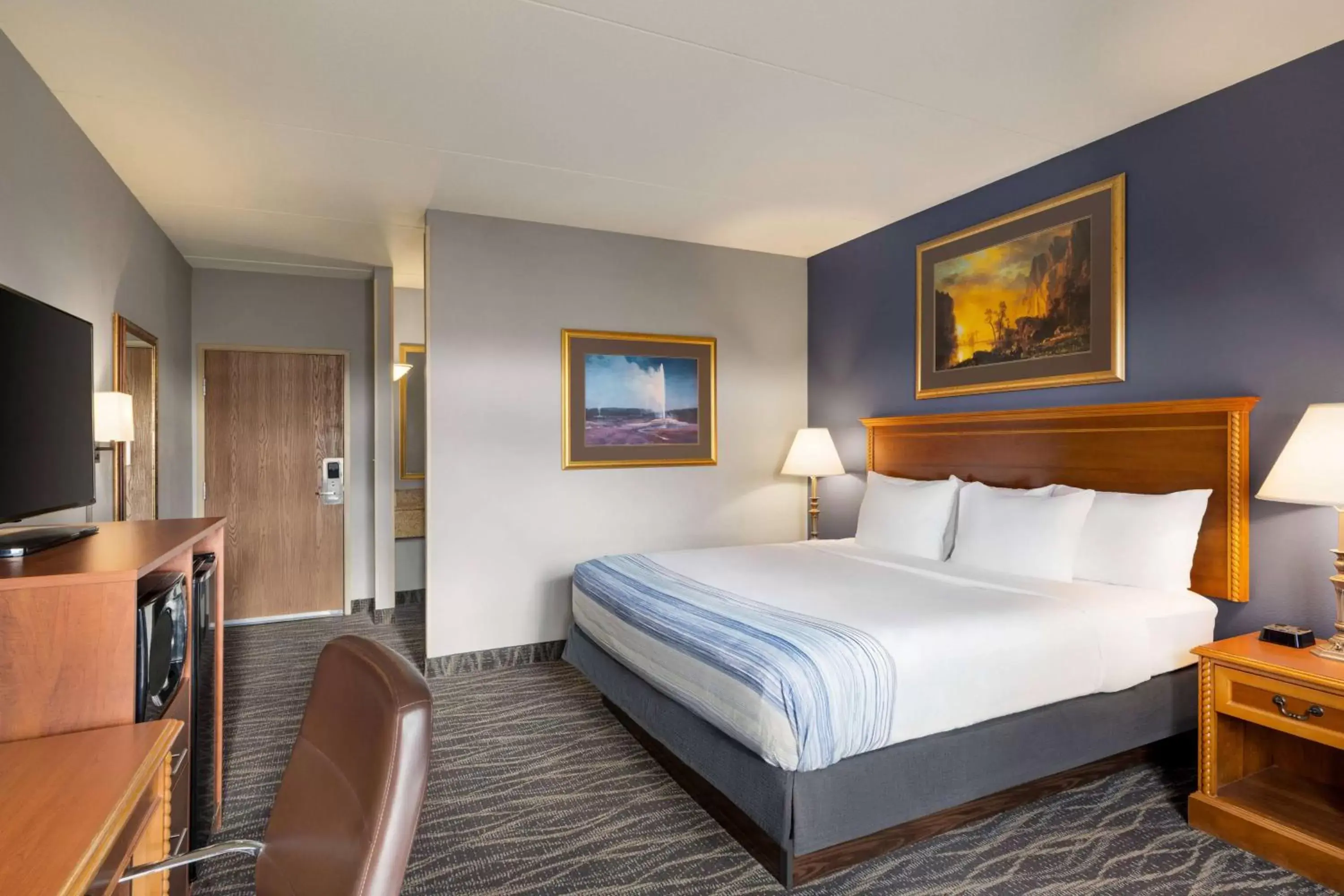 Photo of the whole room, Bed in AmericInn by Wyndham Laramie Near University of Wyoming