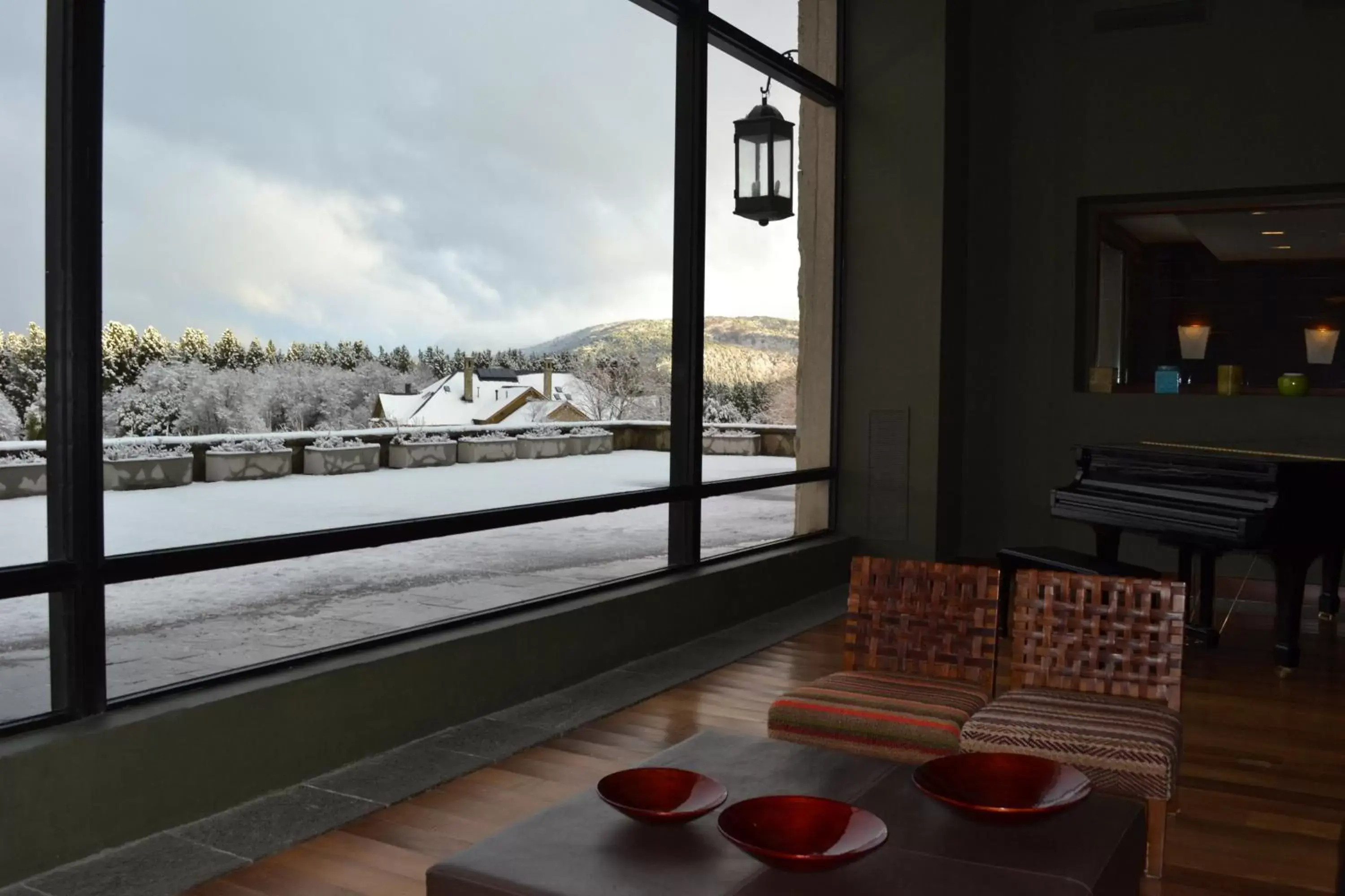 Living room, View in Loi Suites Chapelco Hotel