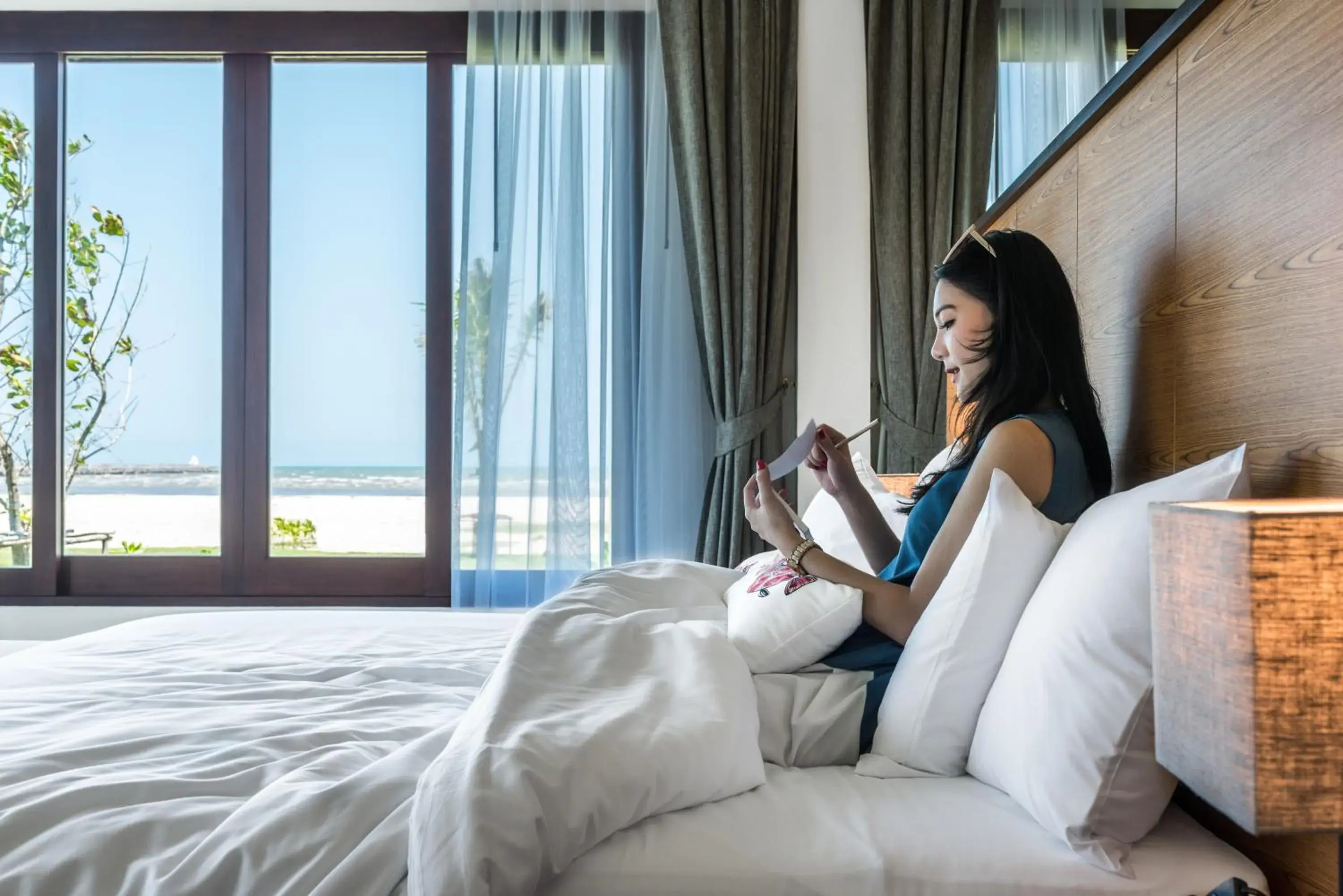 Bed in Triple Tree Beach Resort Bed in Triple Tree Beach Resort