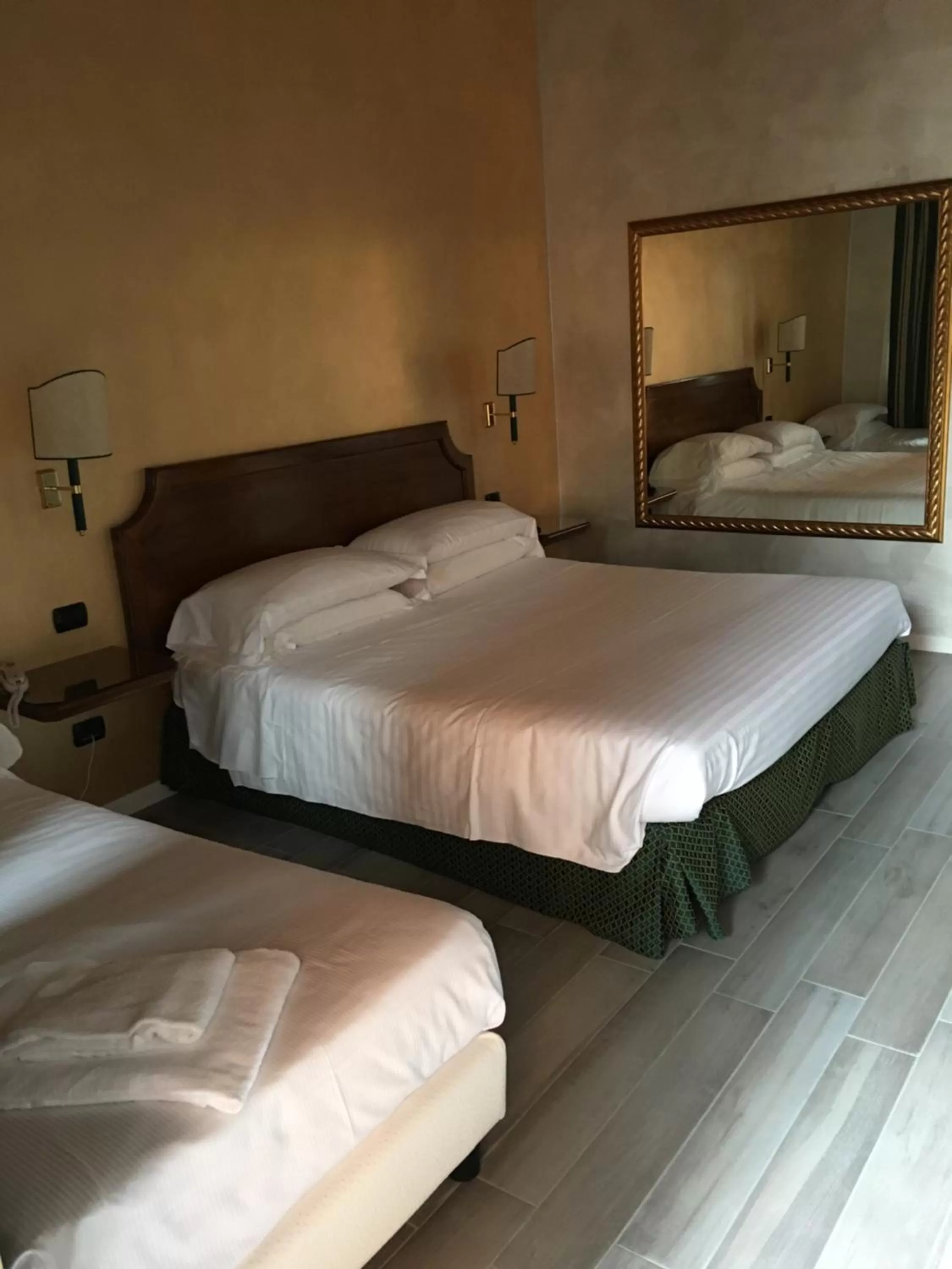 Bed in Hotel Don Carlo