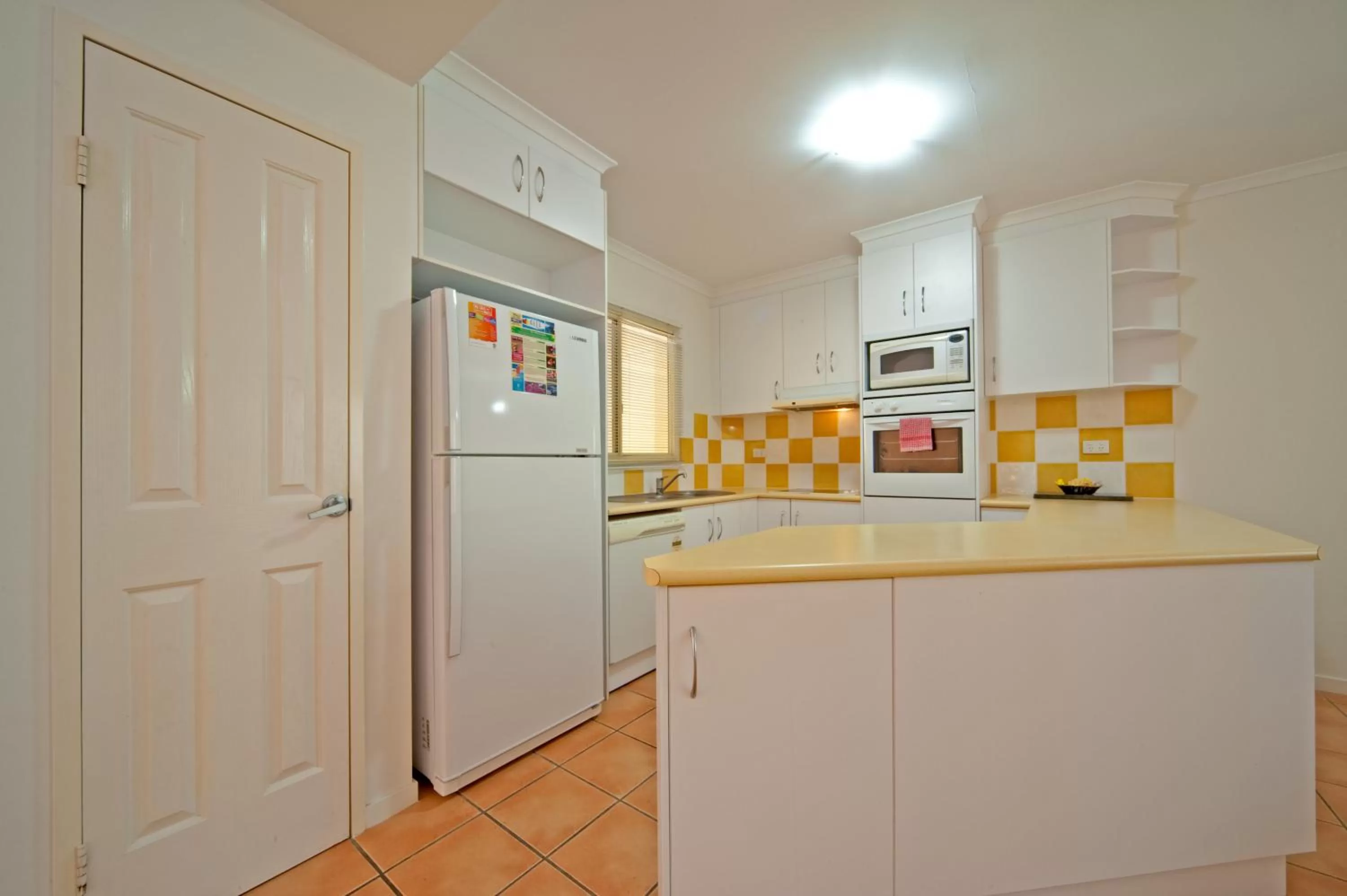 Kitchen or kitchenette in at Beach Court Holiday Villas