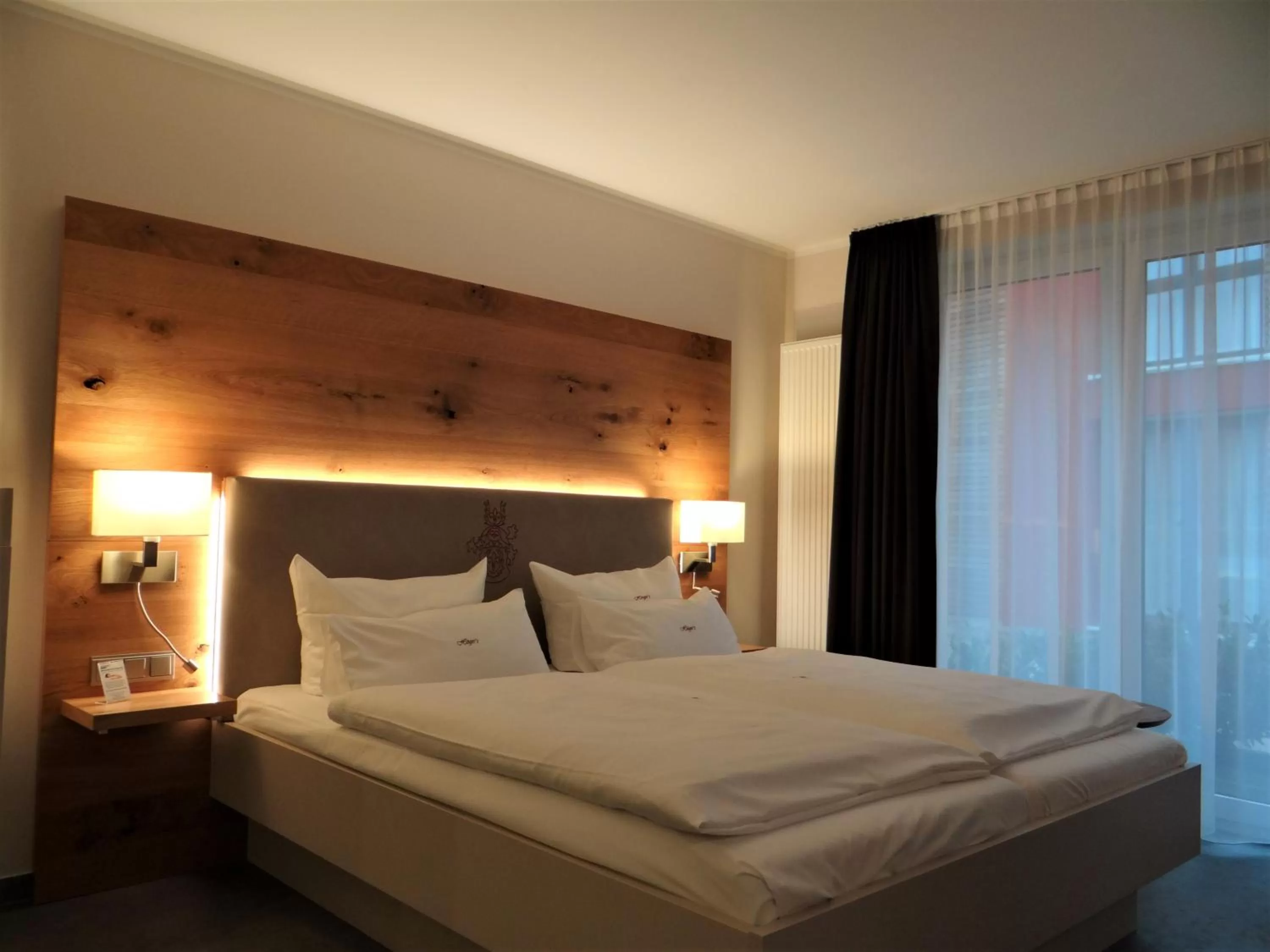Photo of the whole room, Bed in Höger's Hotel & Restaurant